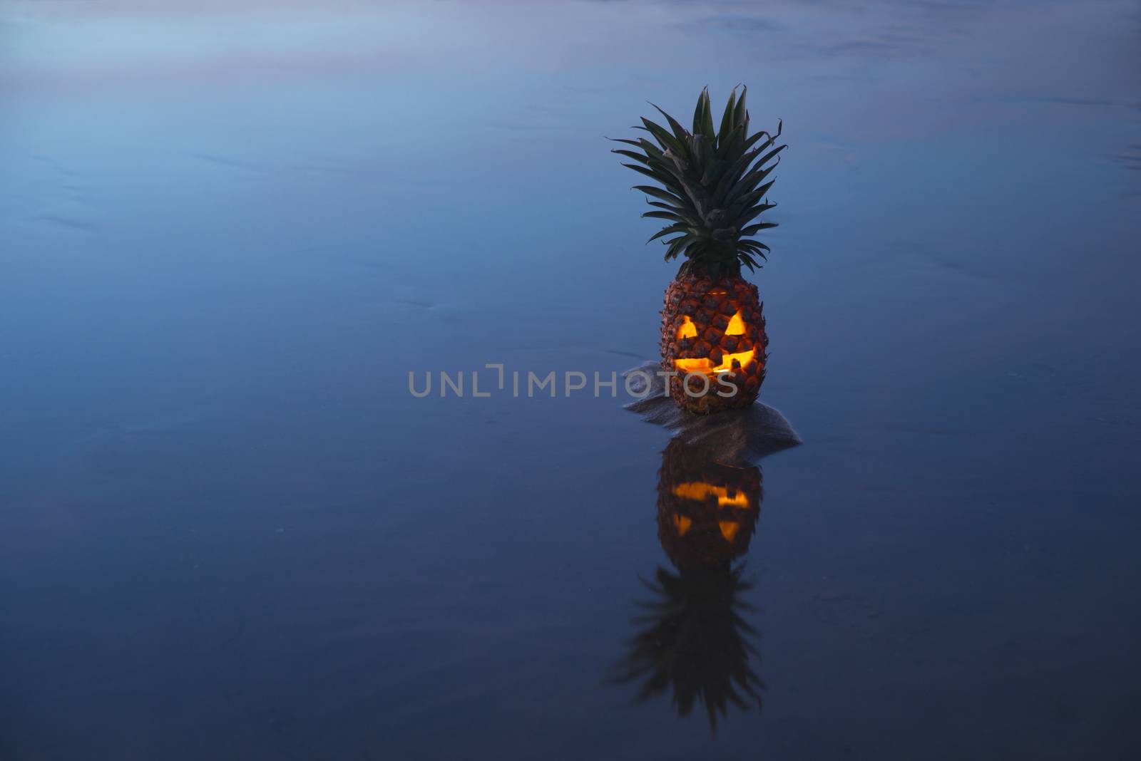 Jack o lantern halloween pinapple with reflection