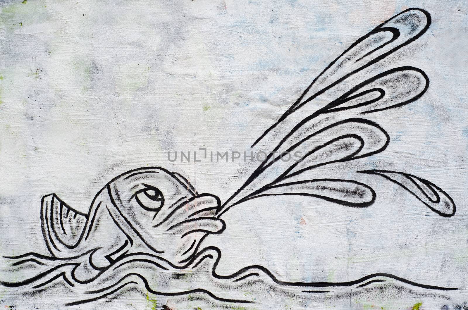fish as graffiti on a wall
