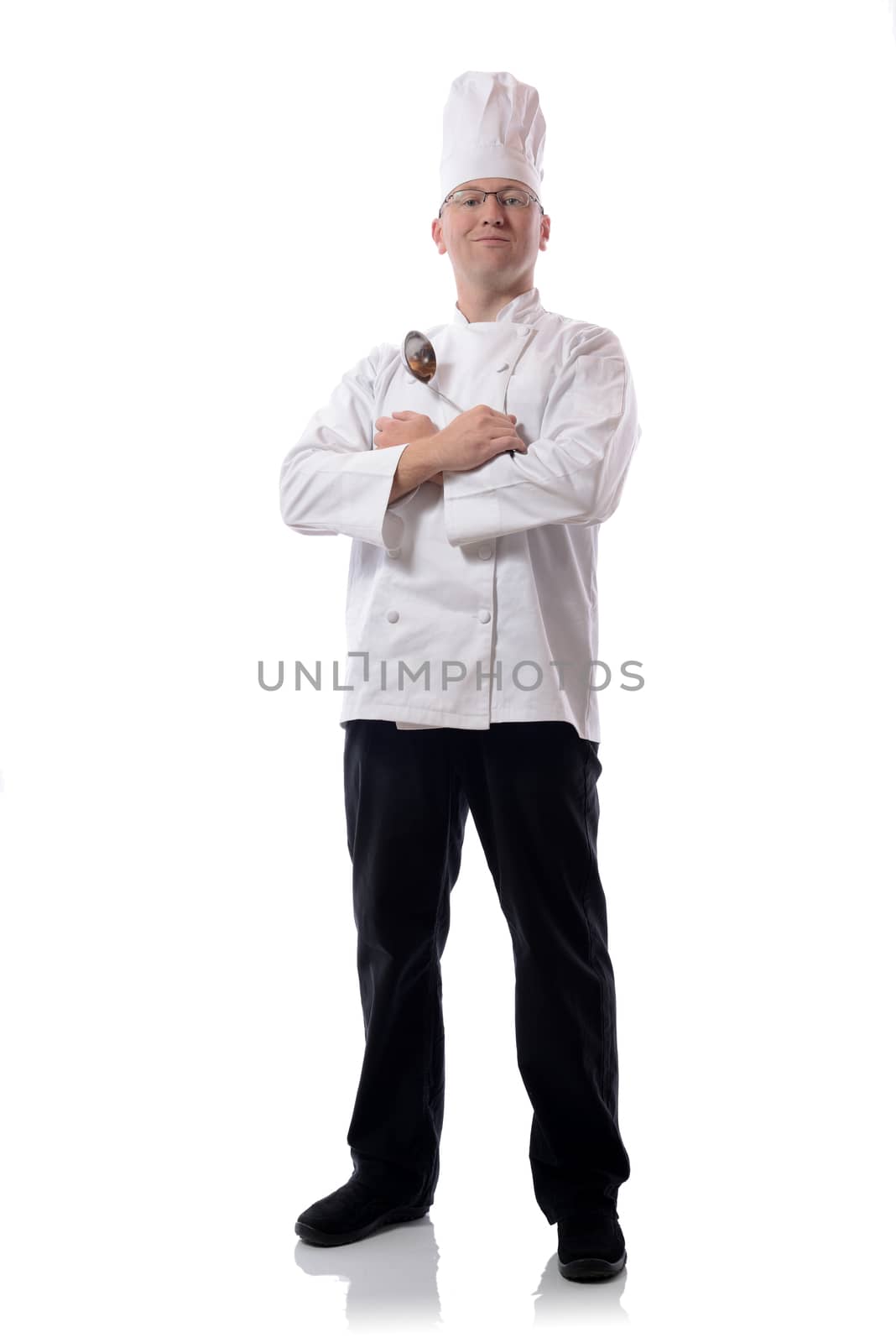 Male chef smiling with ladel sign isolated on white