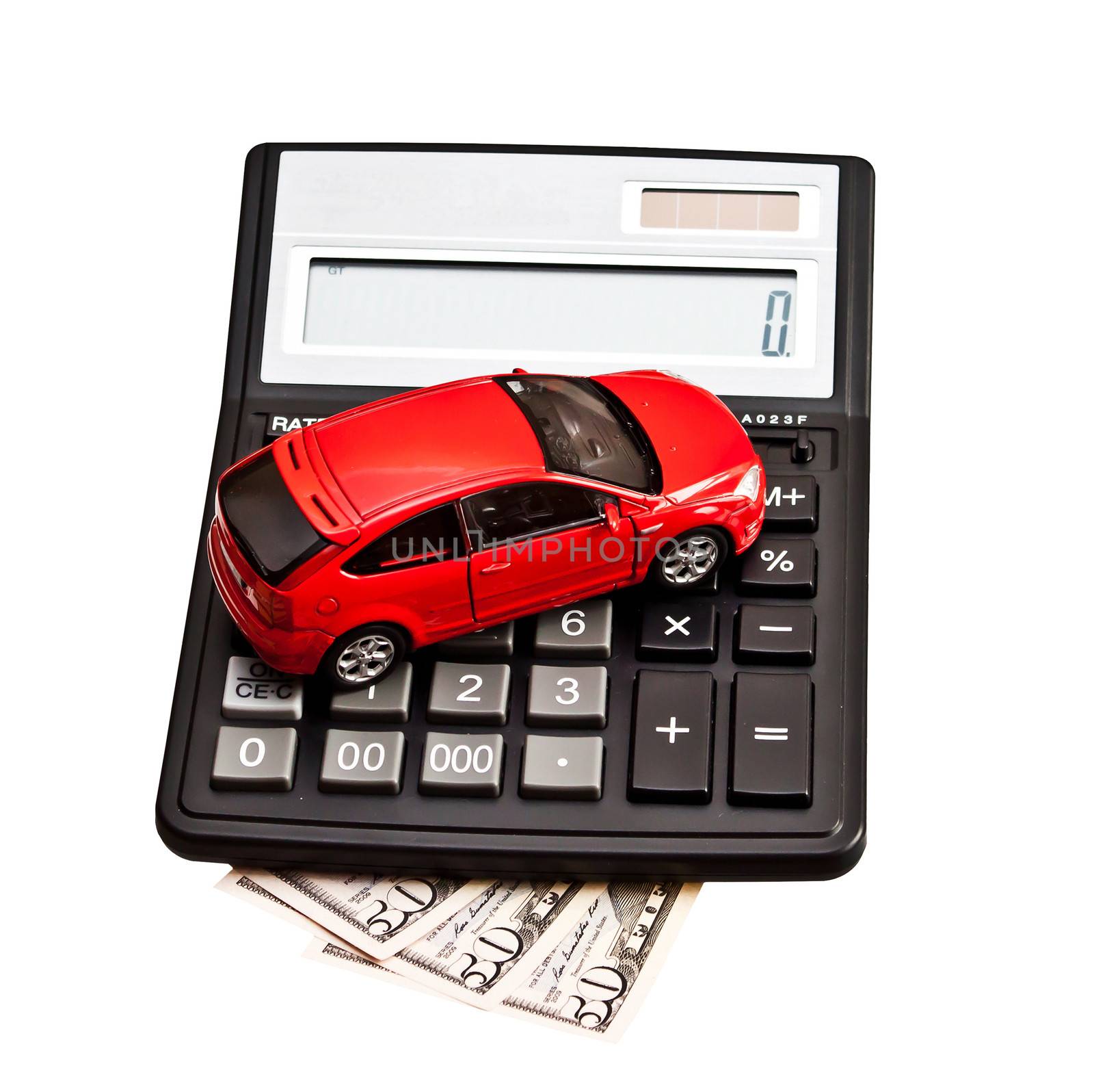 Toy car and calculator over white. Concept for buying, renting, insurance, fuel, service and repair costs
