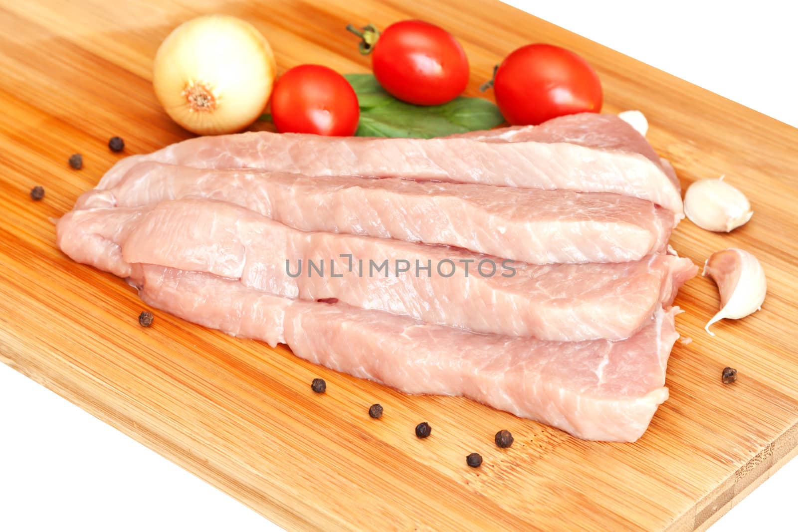 Raw pork with spices and vegetables

