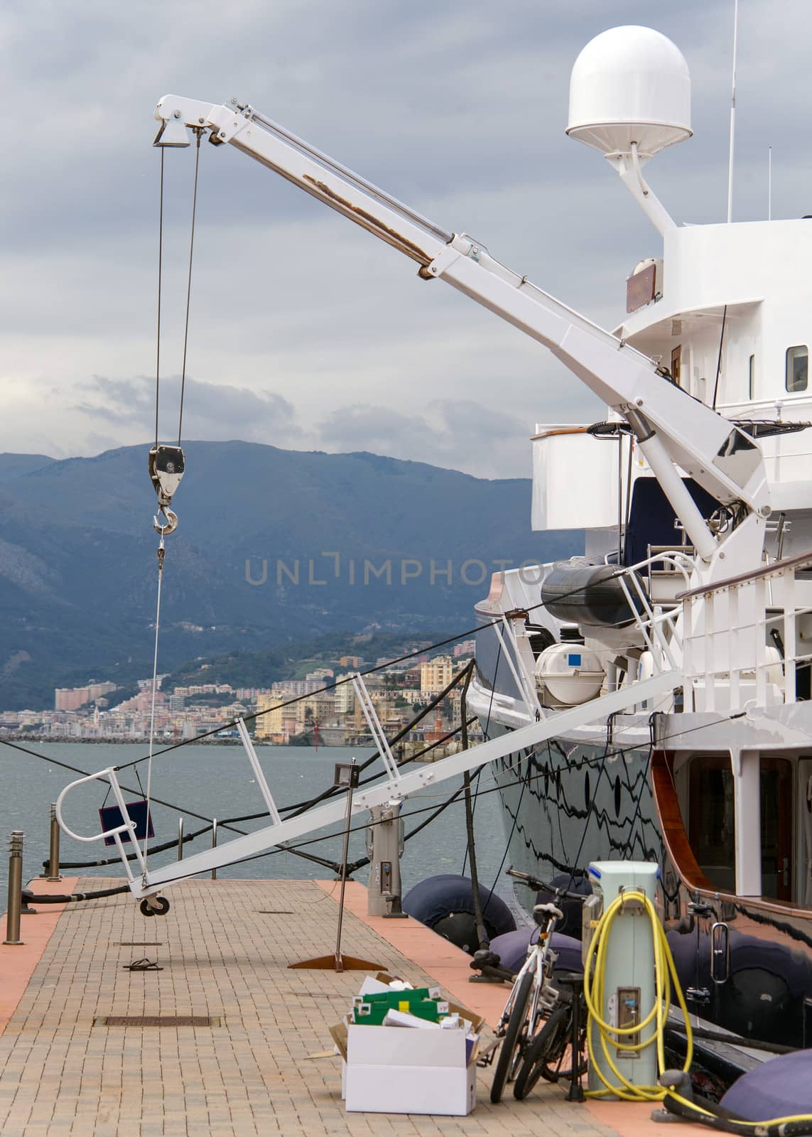 entrance of the yacht held up by a crane