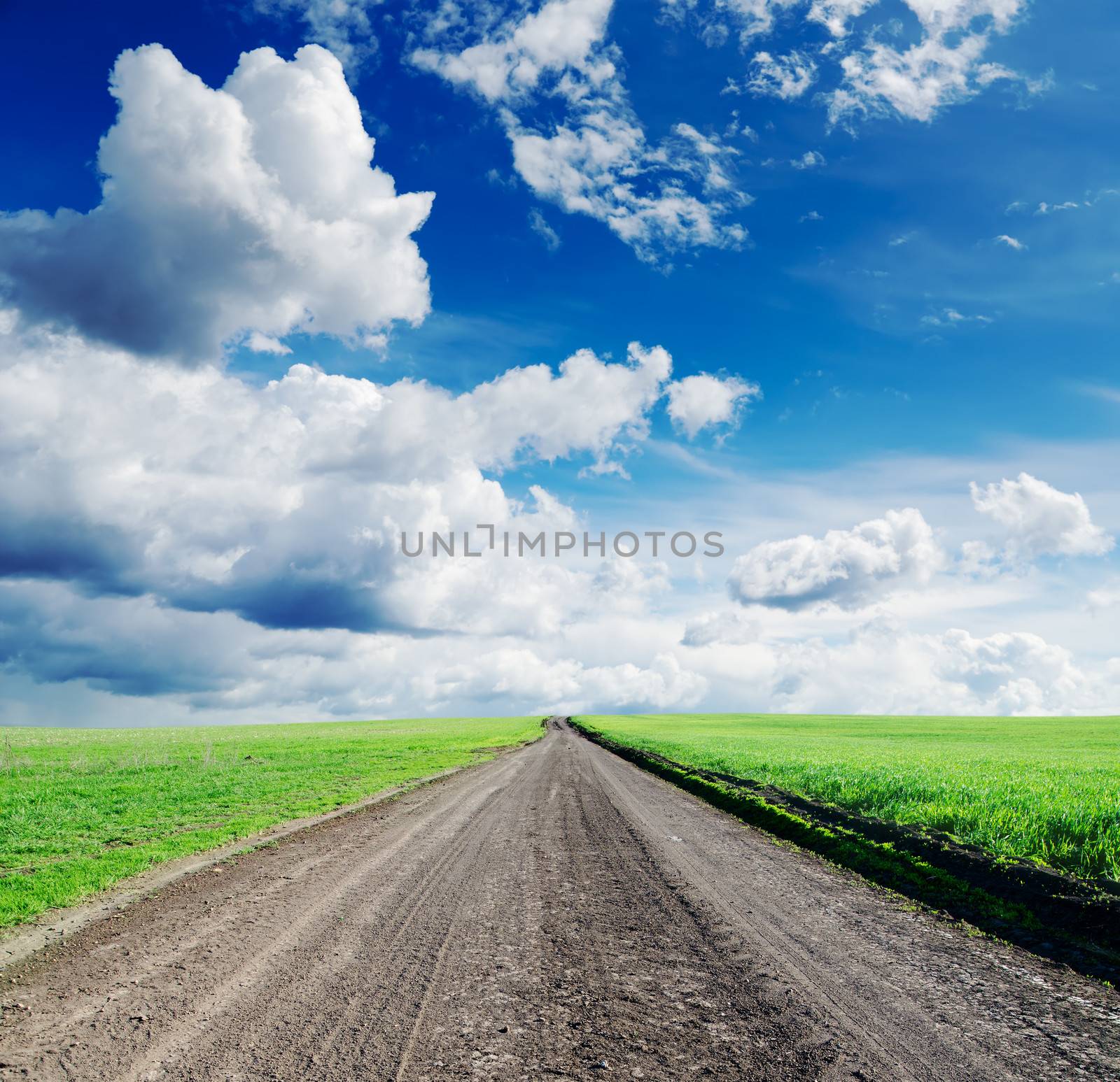 rural road under dramatic sky