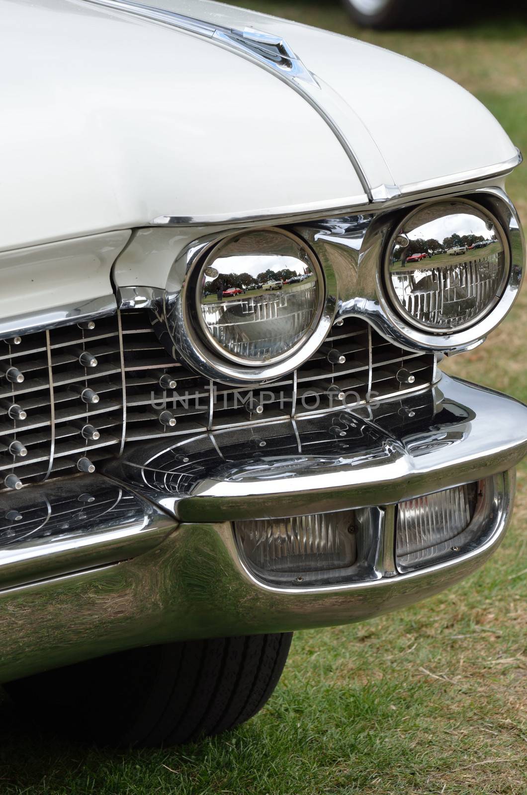 White classic car detail with headlamps by pauws99