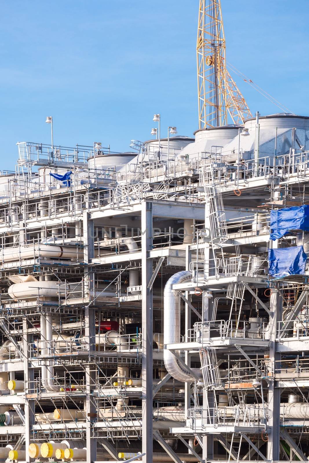 Assembling of liquefied natural gas Refinery Factory with LNG storage tank using for Oil and gas industry background
