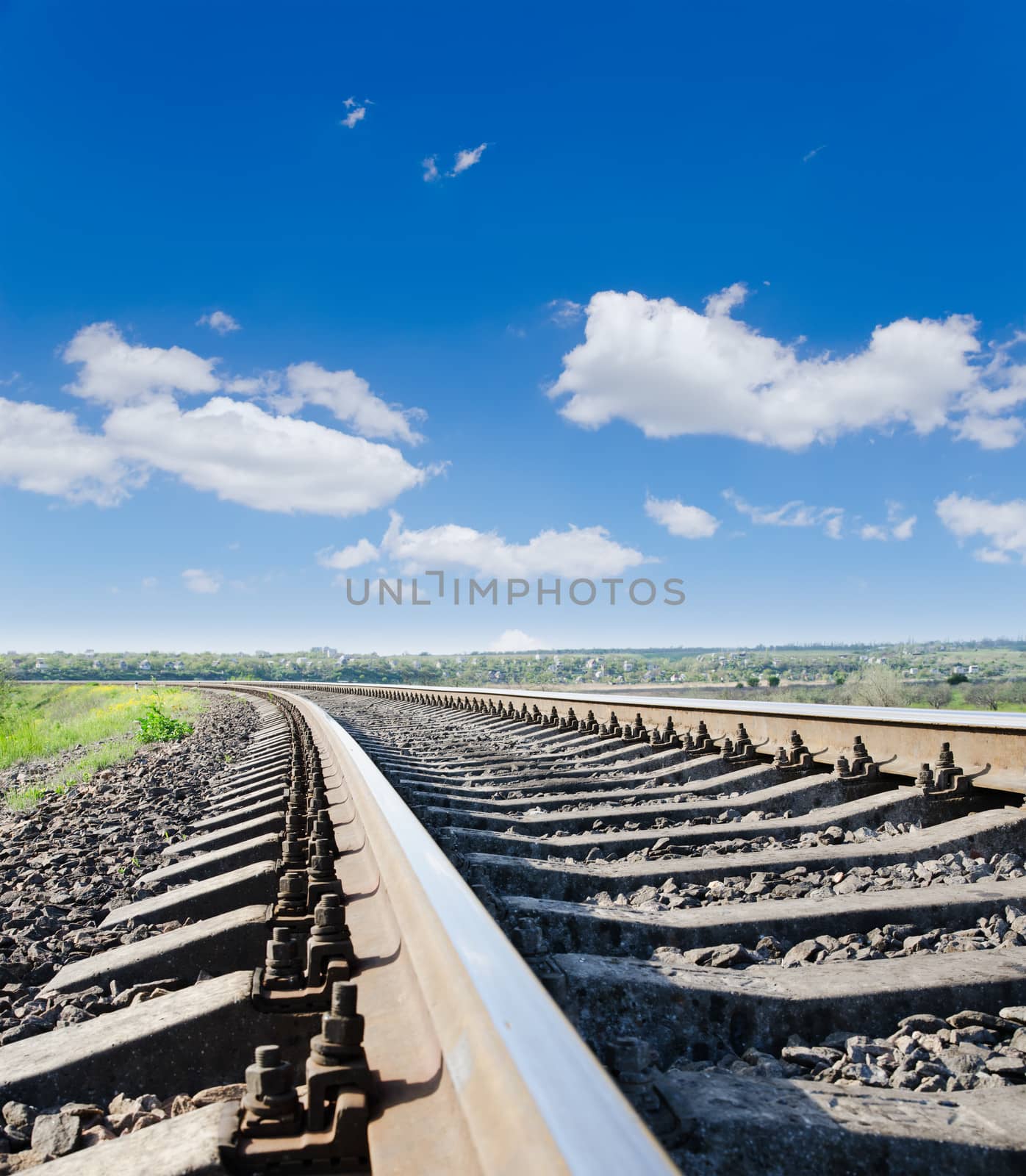 low view to railroad under deep blue sky