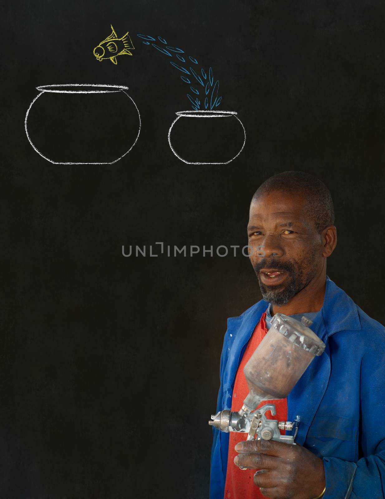 African American black man industrial worker with chalk jumping fish bowls on a blackboard background