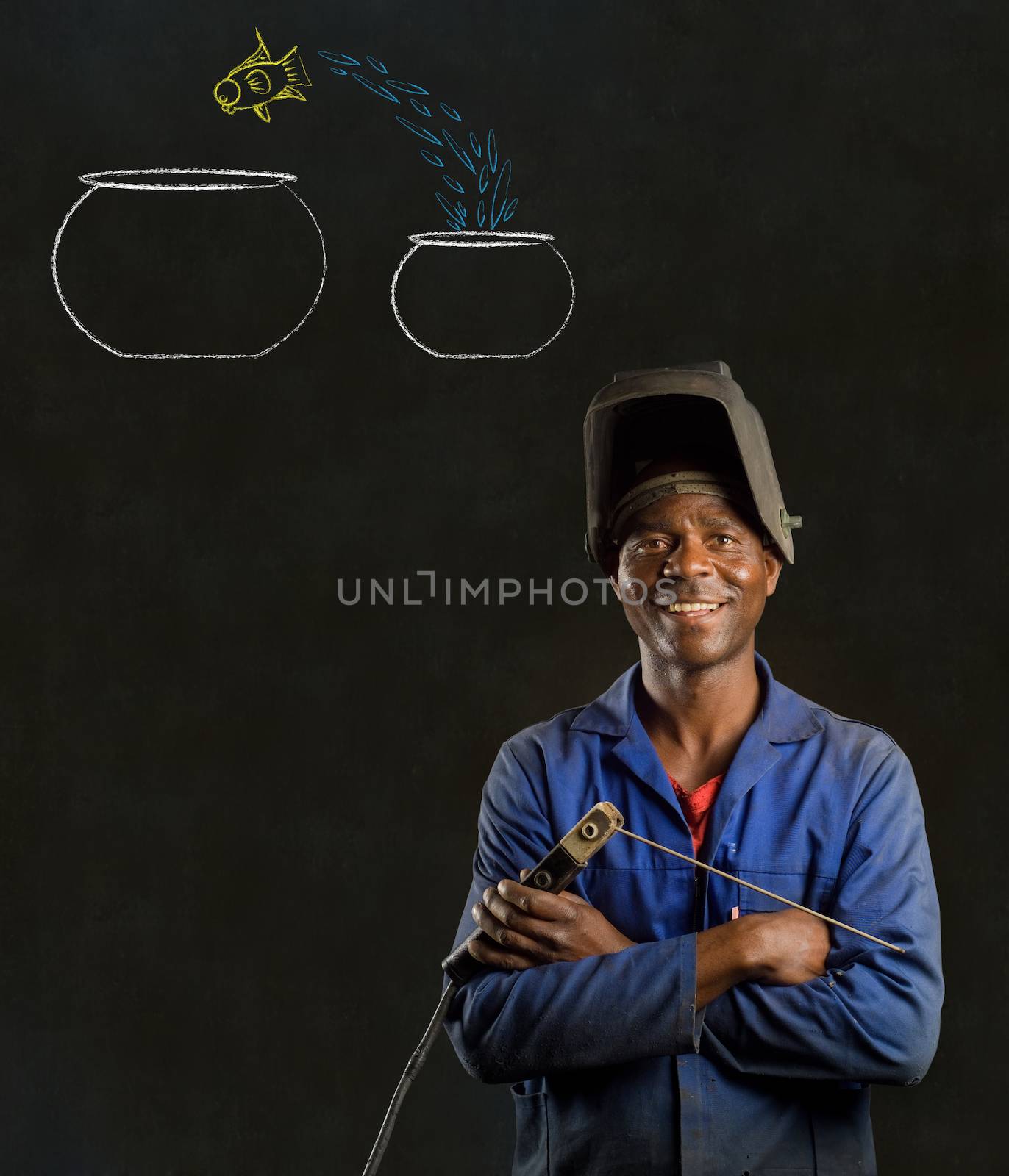 African American black man industrial worker with chalk jumping fish bowls on a blackboard background