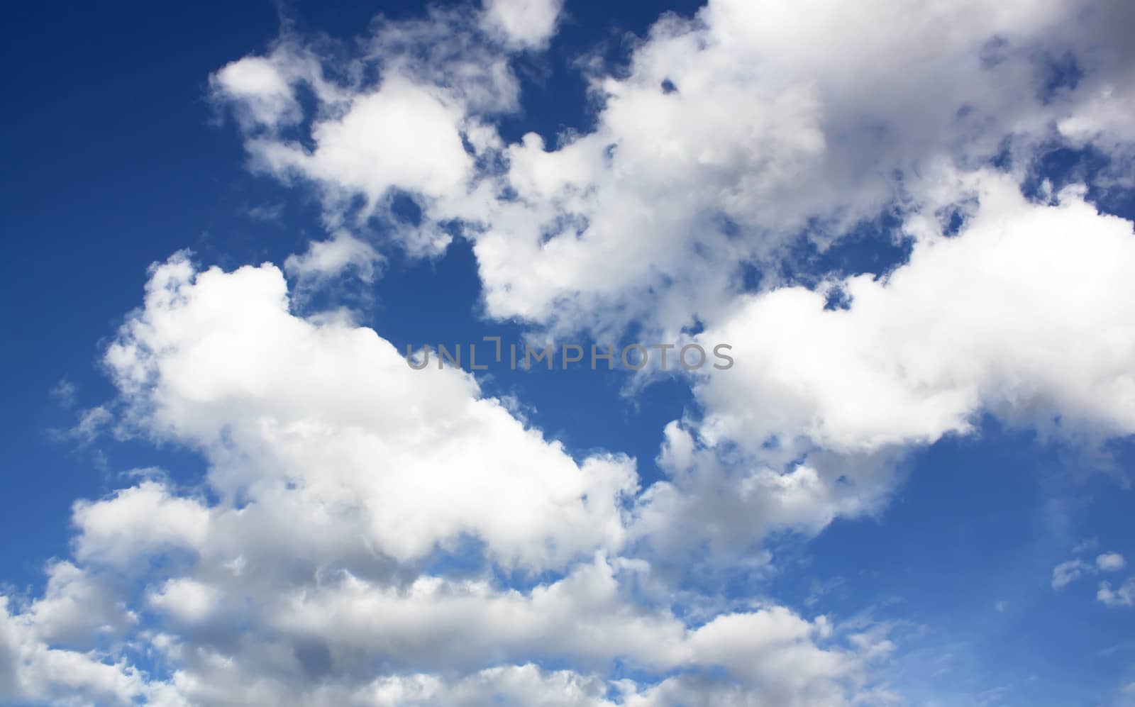 blue sky with cloud closeup by janniwet