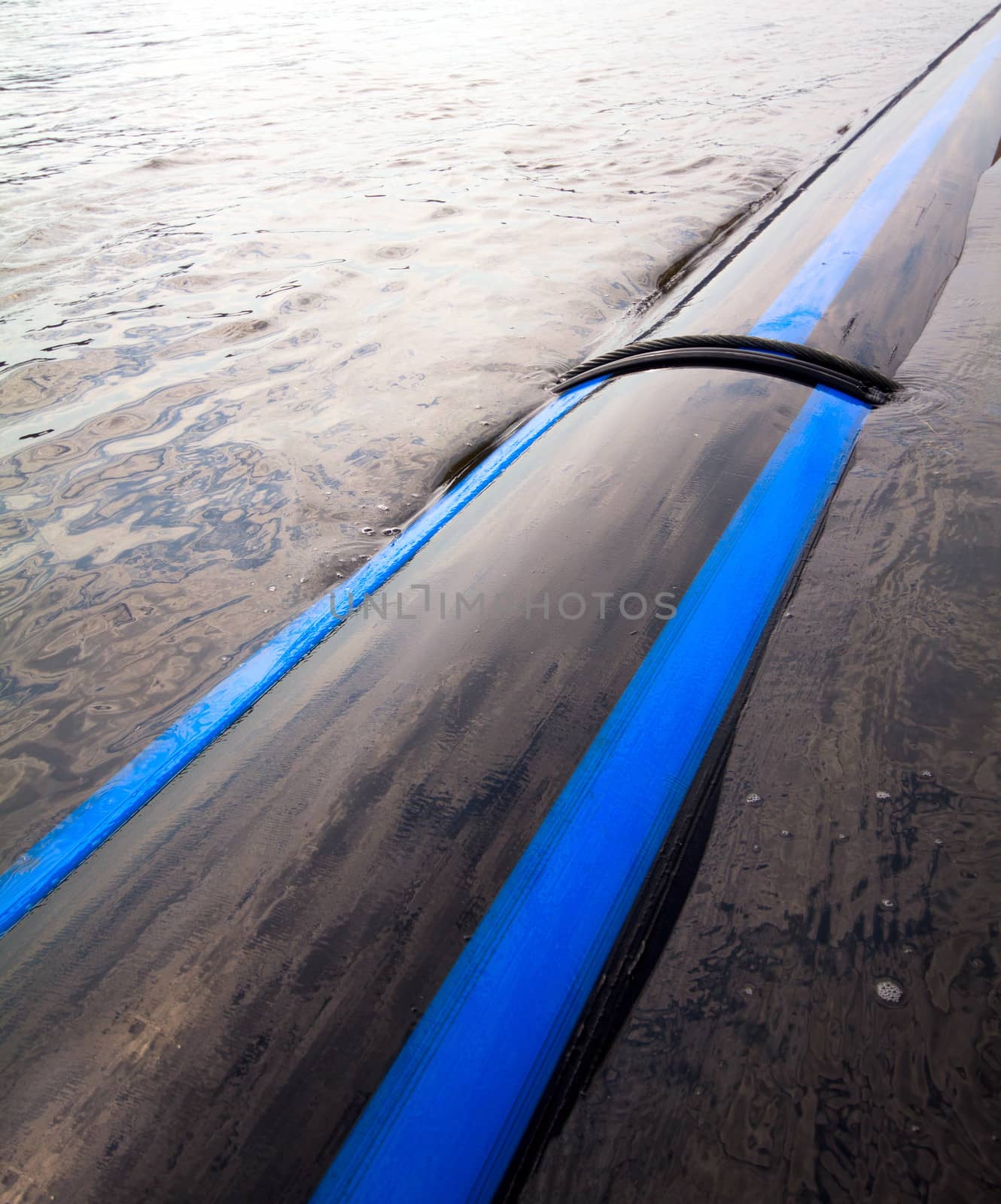 pipe laid in the river along the coast