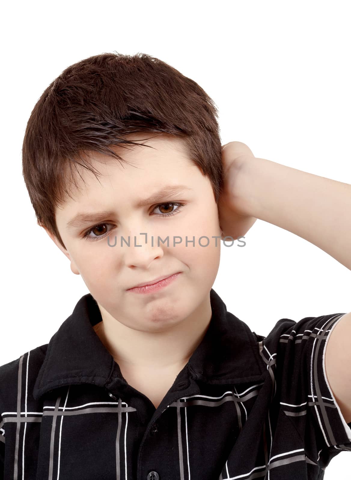 pensive young boy with hand on head isolated on white background