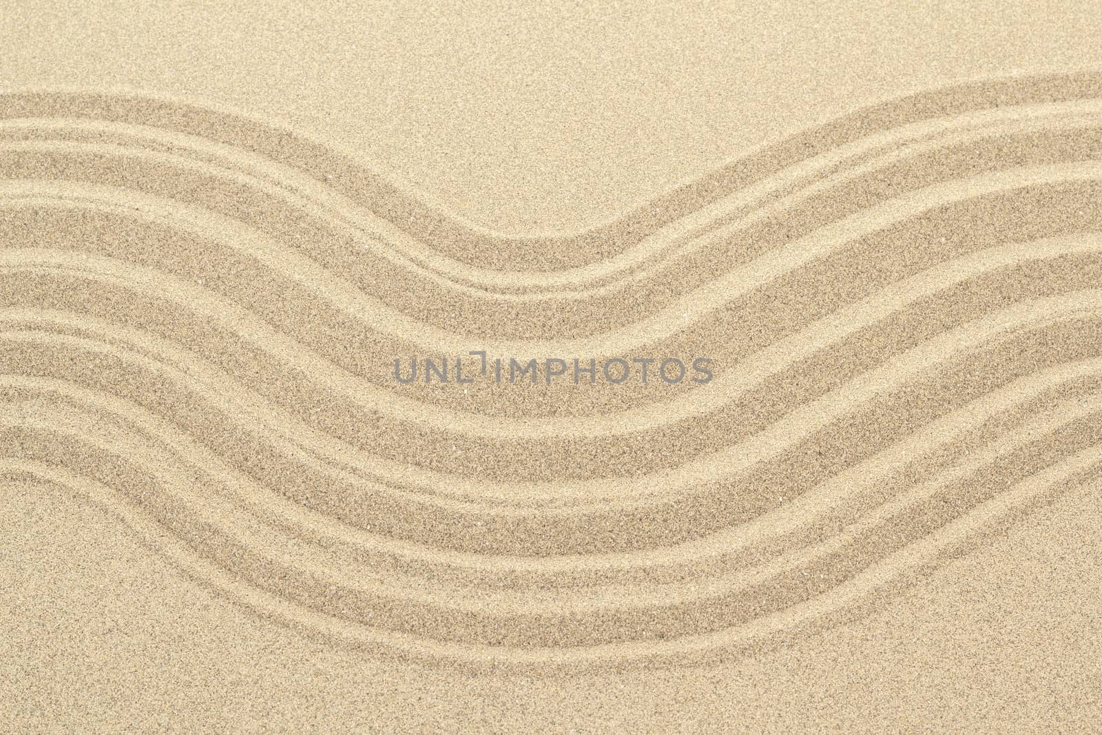 Sandy beach background with lines. Detailed sand texture. Top view 