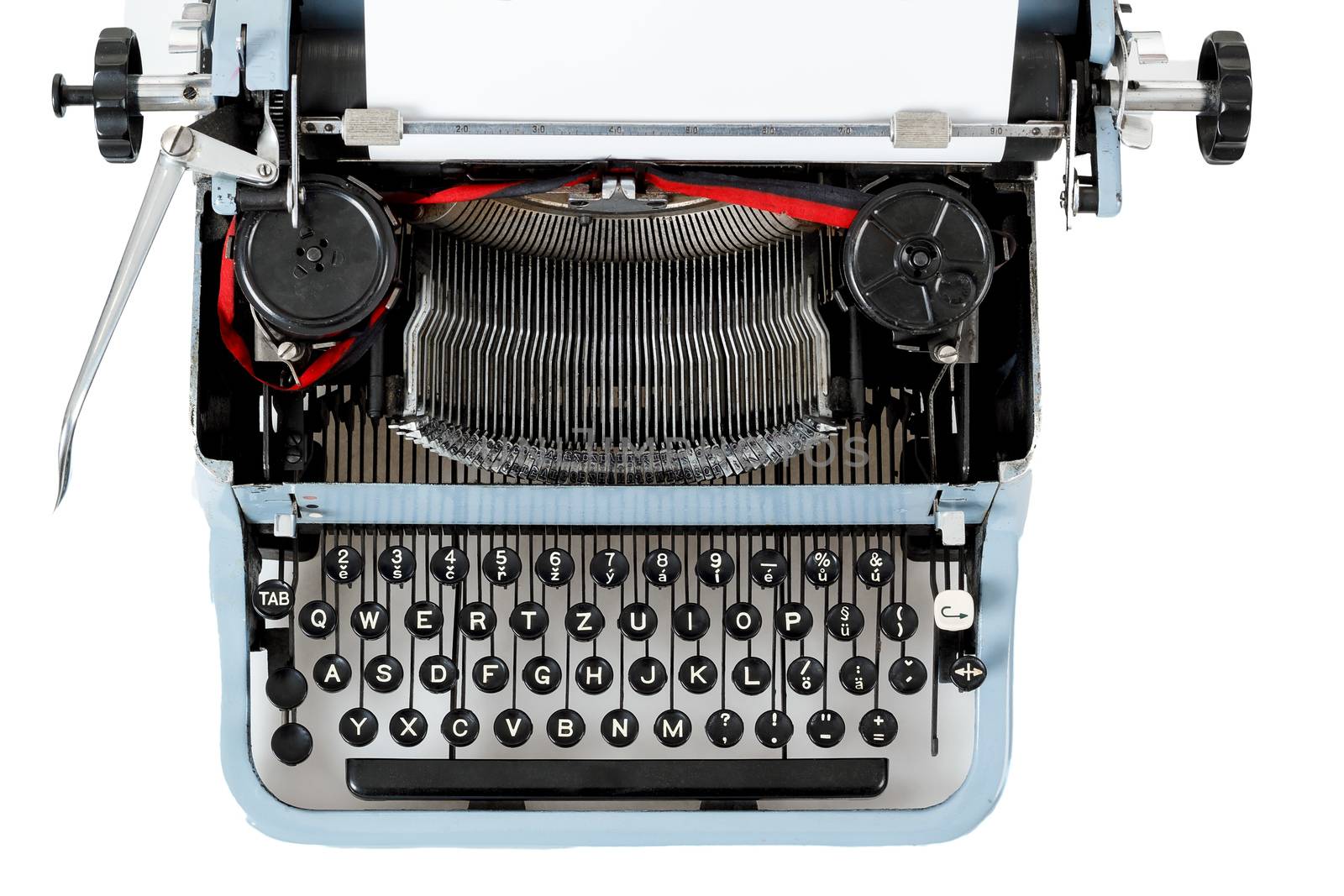 retro uncovered blue typewriter on white background