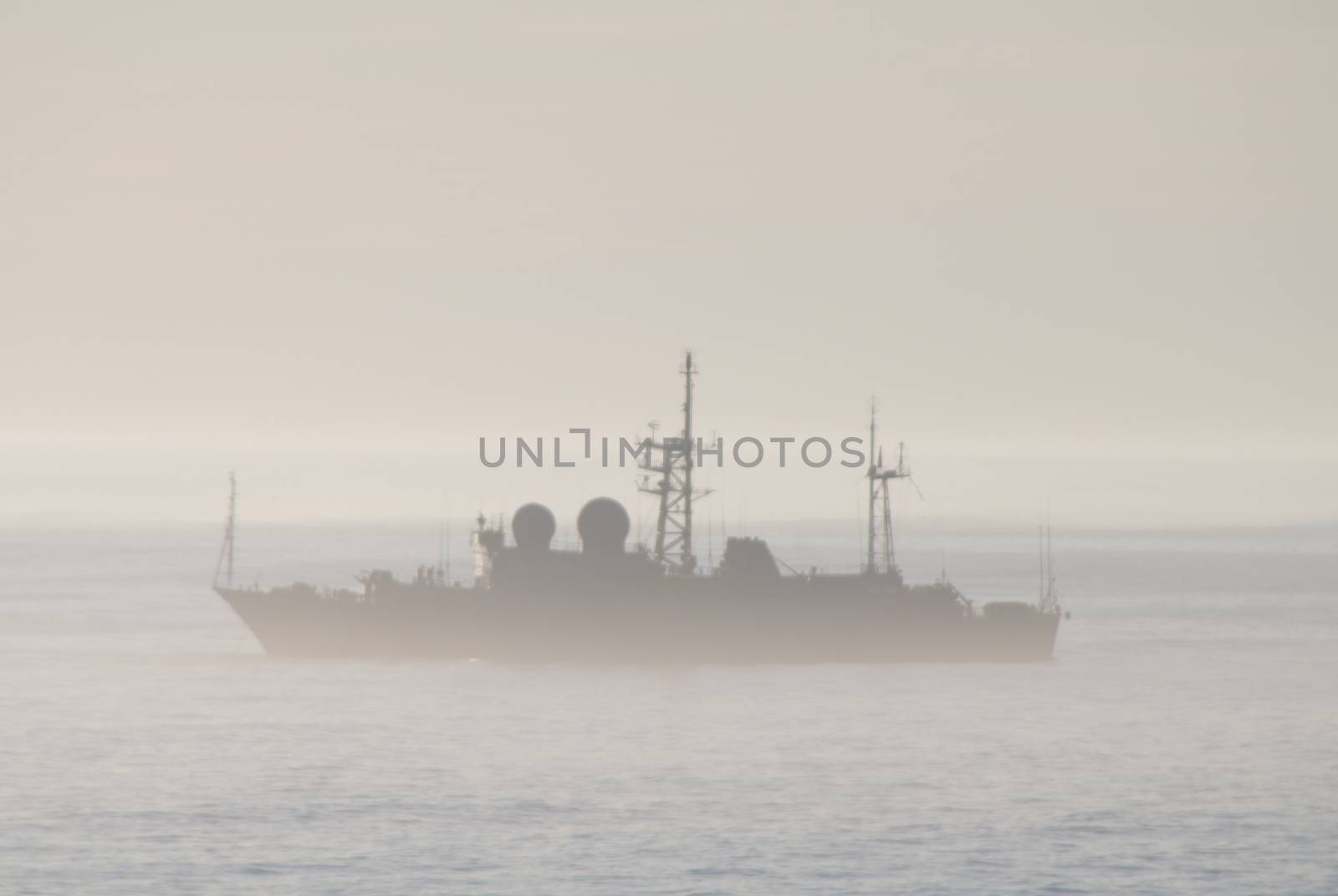 the military ship in a fog