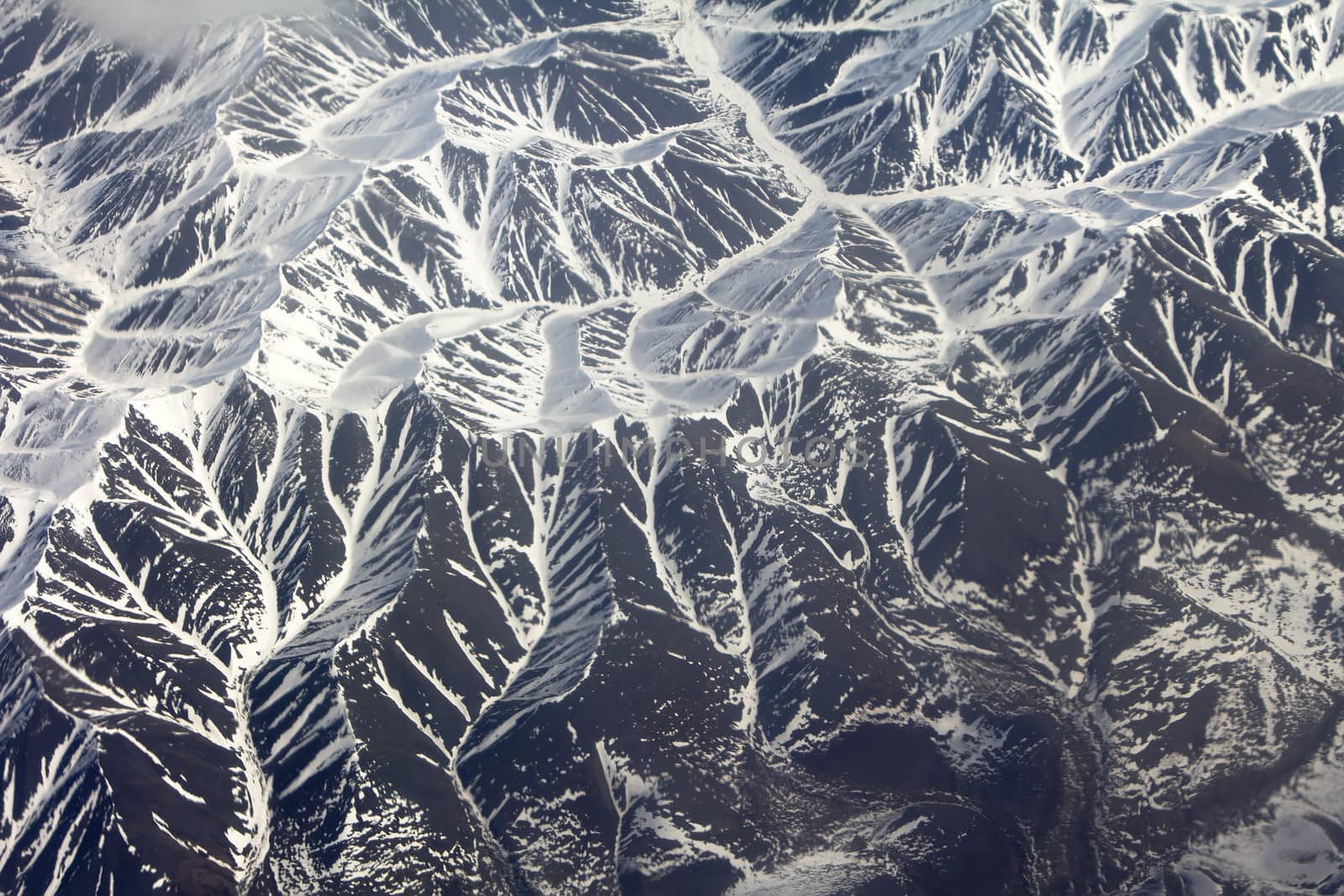 Mountains in the spring: view from height. Chersky Range. Siberia.