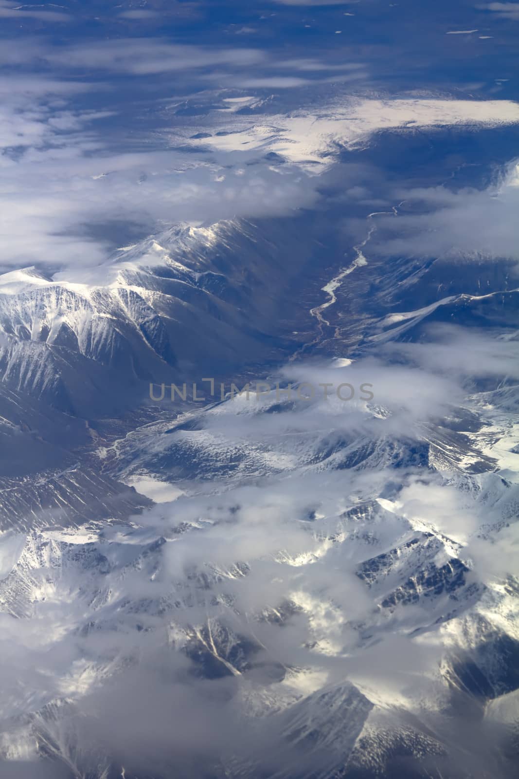 Mountains in the spring: view from height. Chersky Range. Siberia.