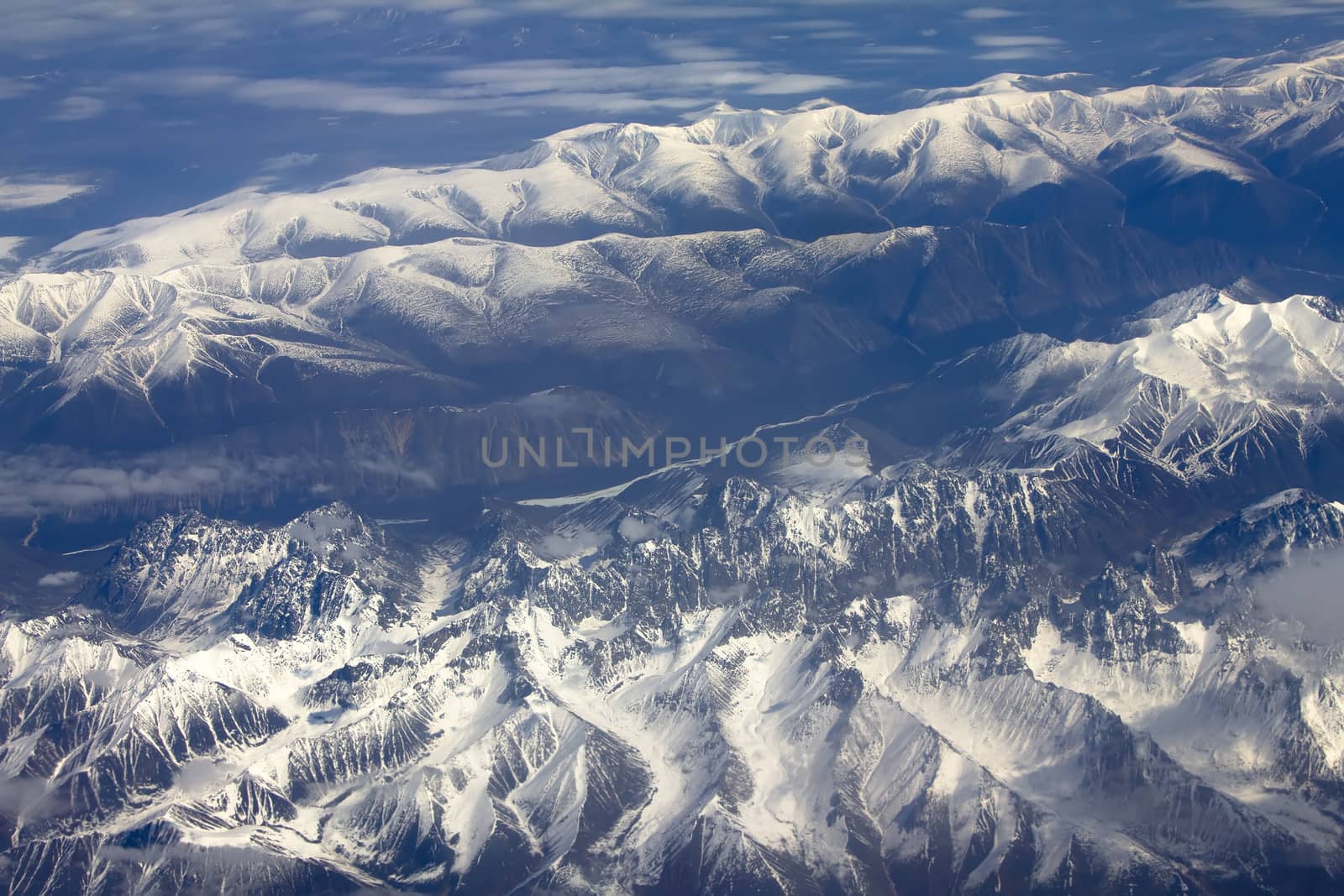 Mountains in the spring: view from height. Chersky Range. Siberia.