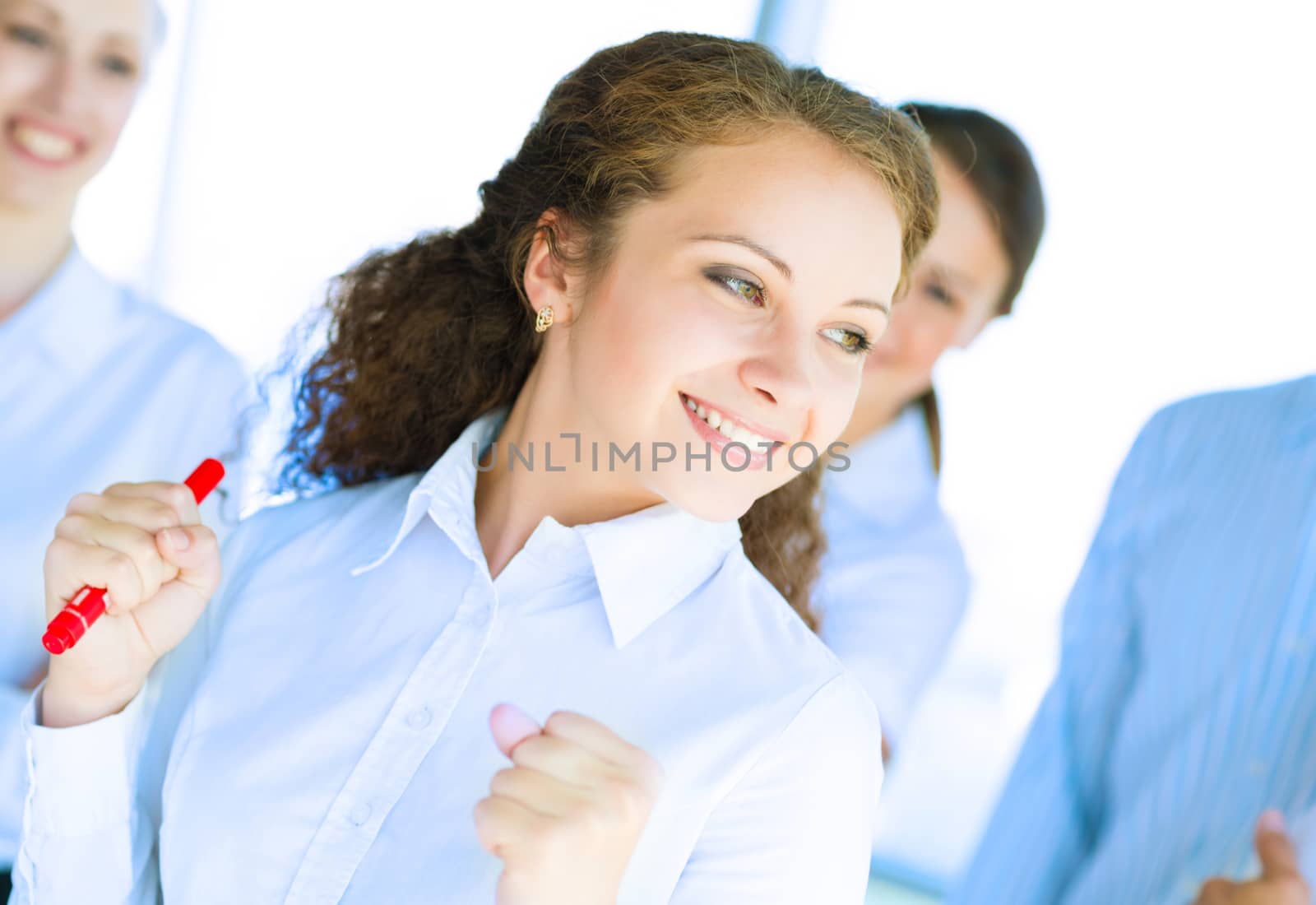 happy business woman standing next to their counterparts outside the flipchart achievements in business