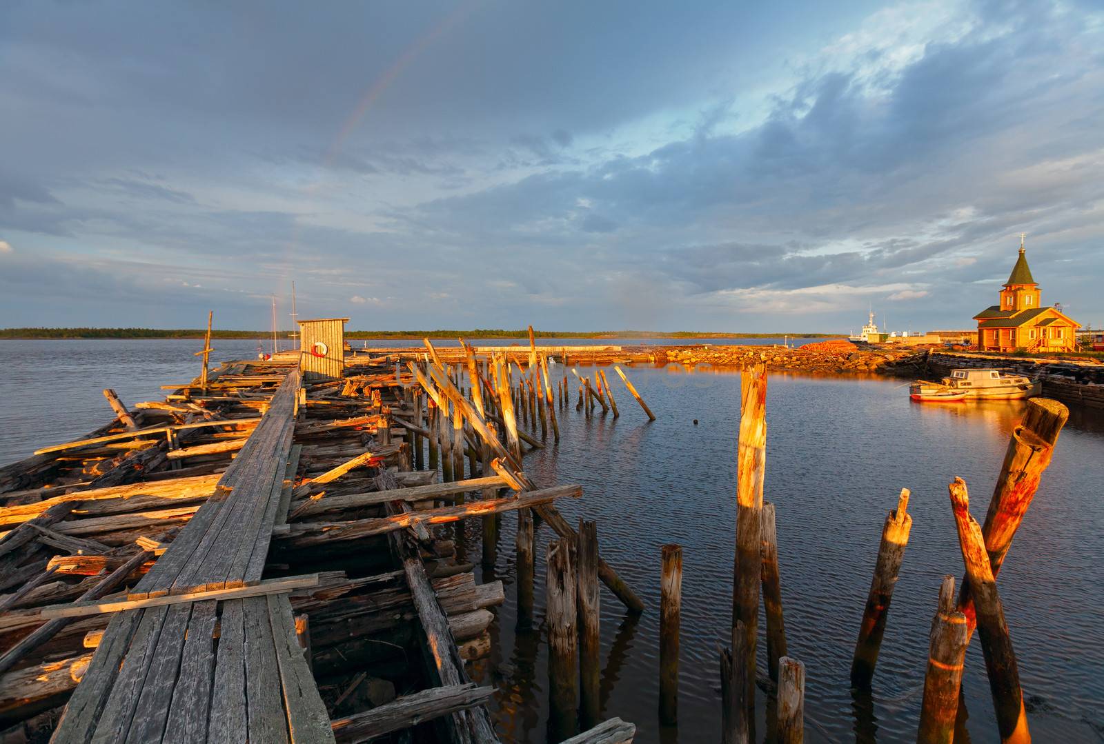 Old wooden pier at sunset.  White Sea; Karelia; Russia; 