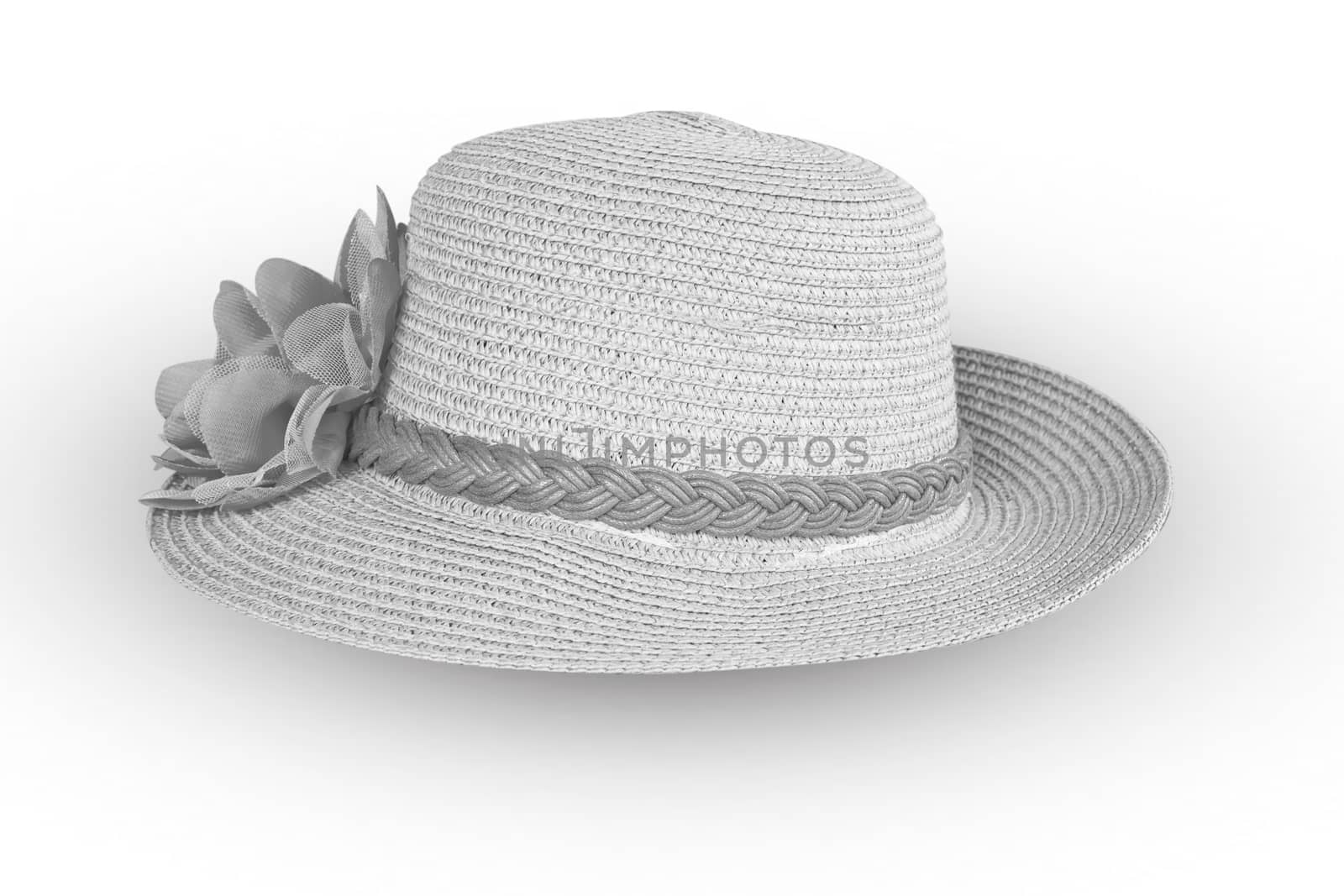 Pretty straw hat with flower on white background