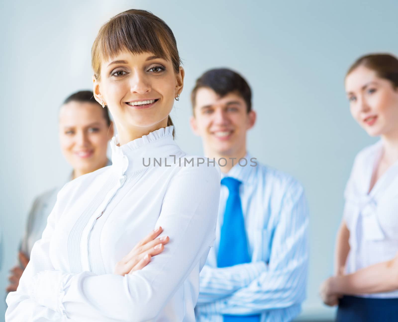 concept of teamwork, business woman crossed her arms over her team