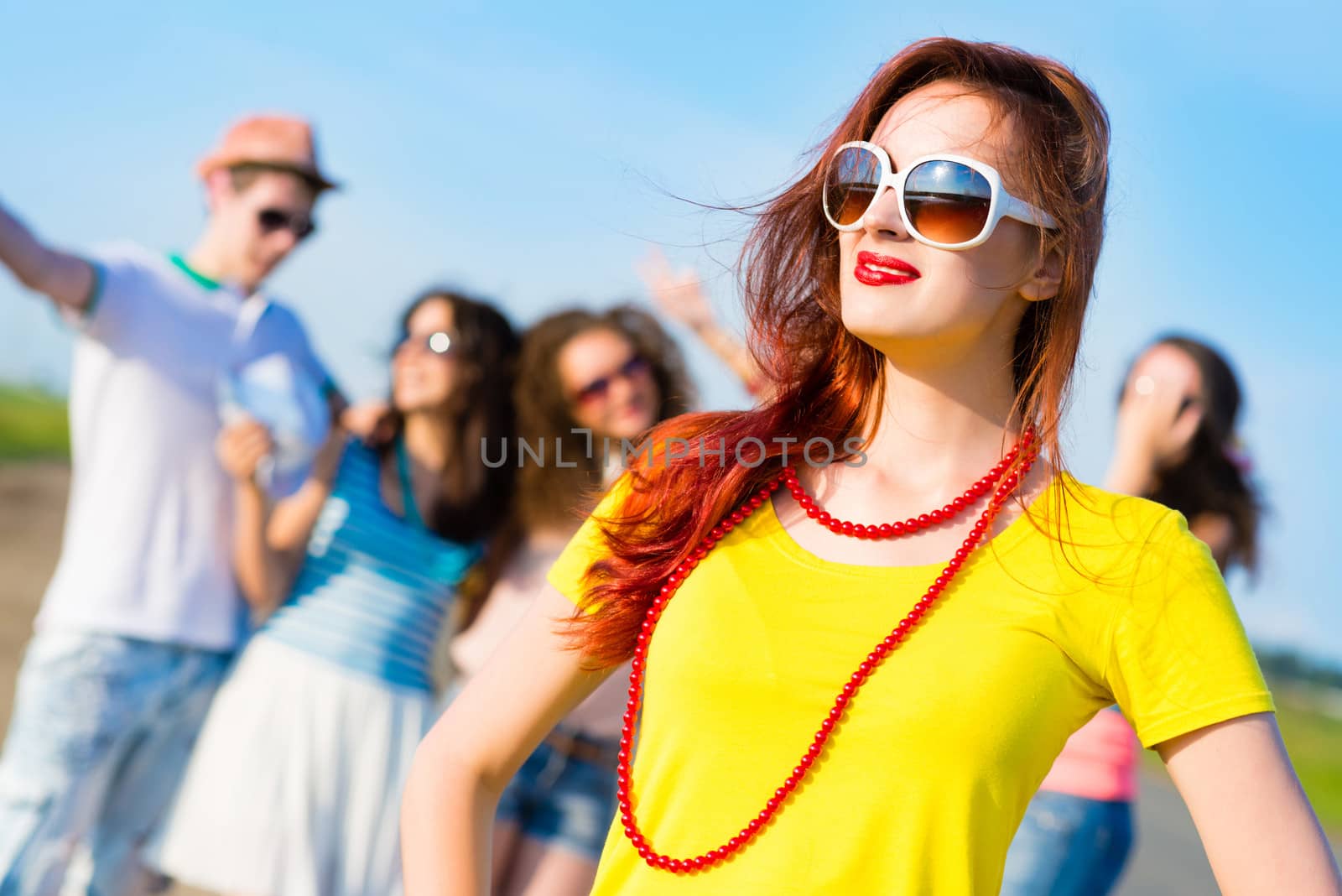 stylish young woman in sunglasses by adam121