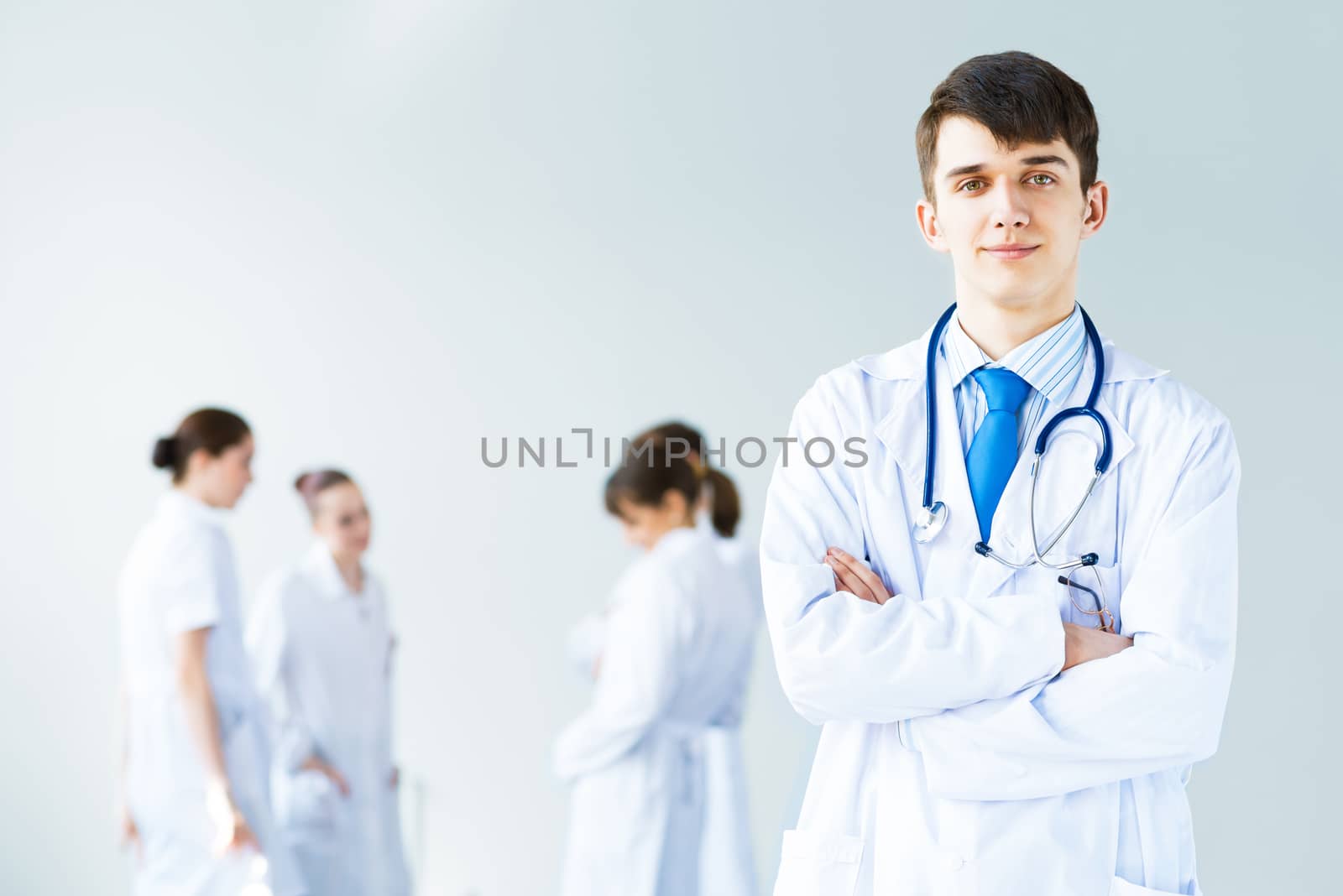 portrait of successful young doctor by adam121