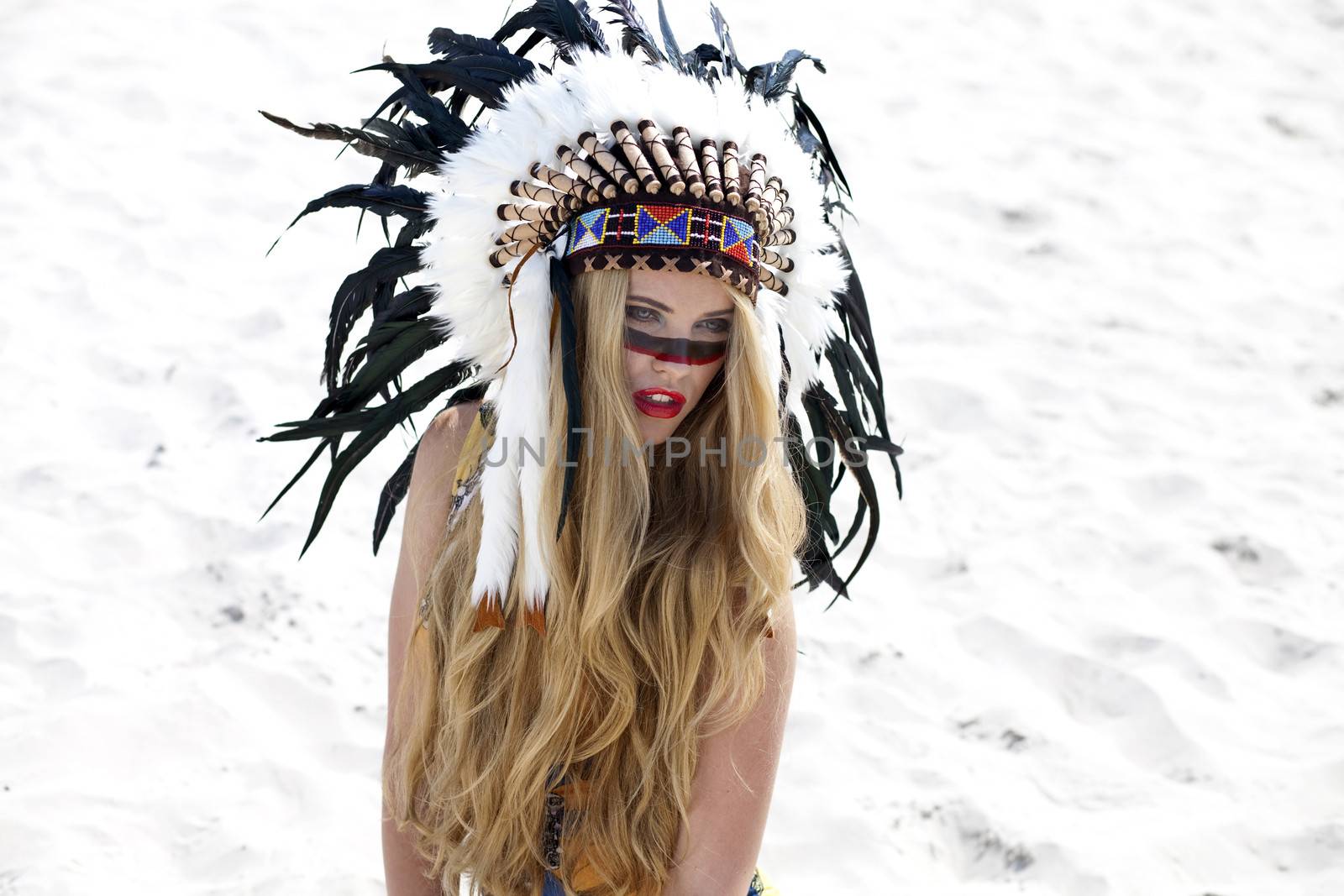 Young woman in costume of American Indian