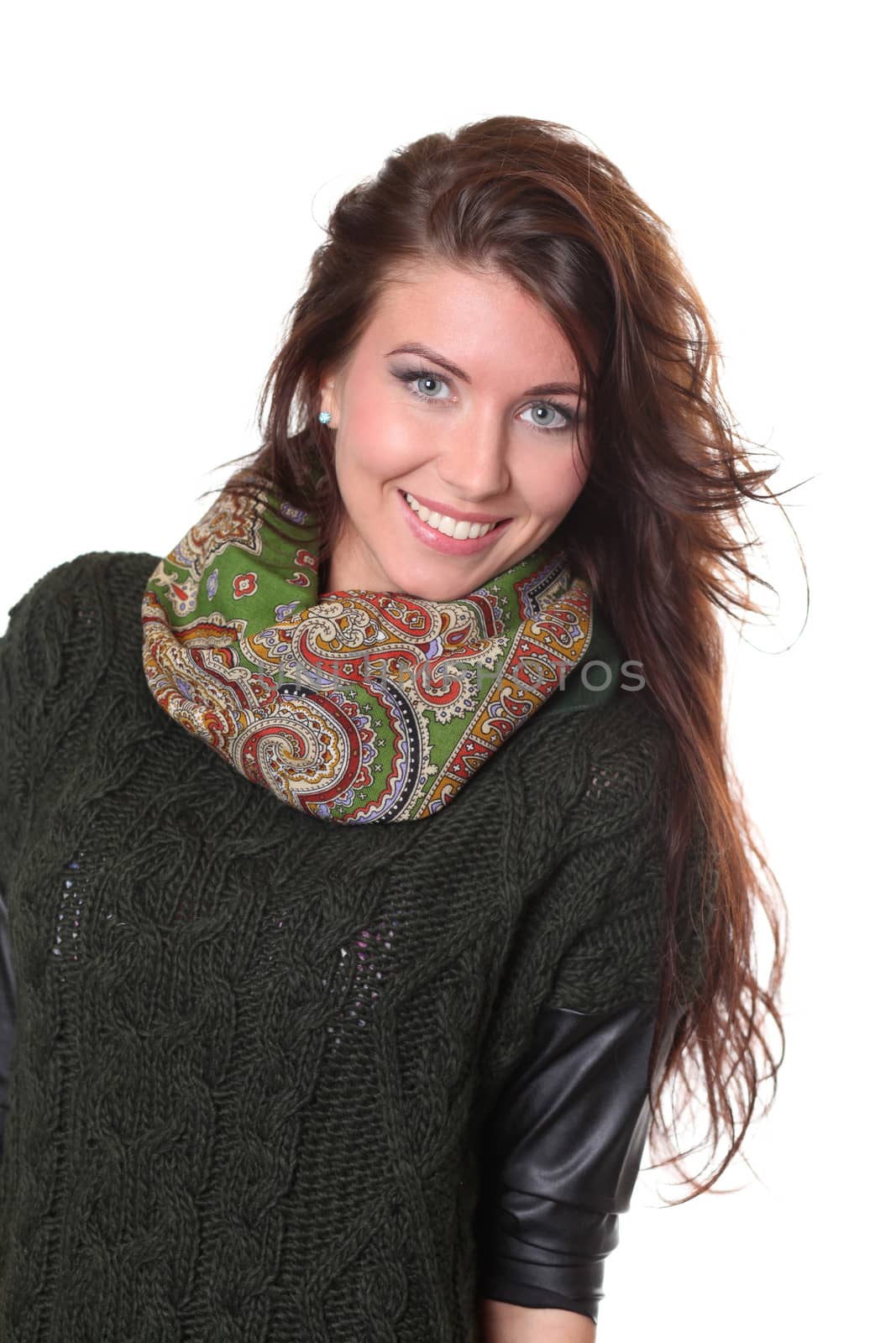 portrait of a beautiful happy woman in a knitted jacket
