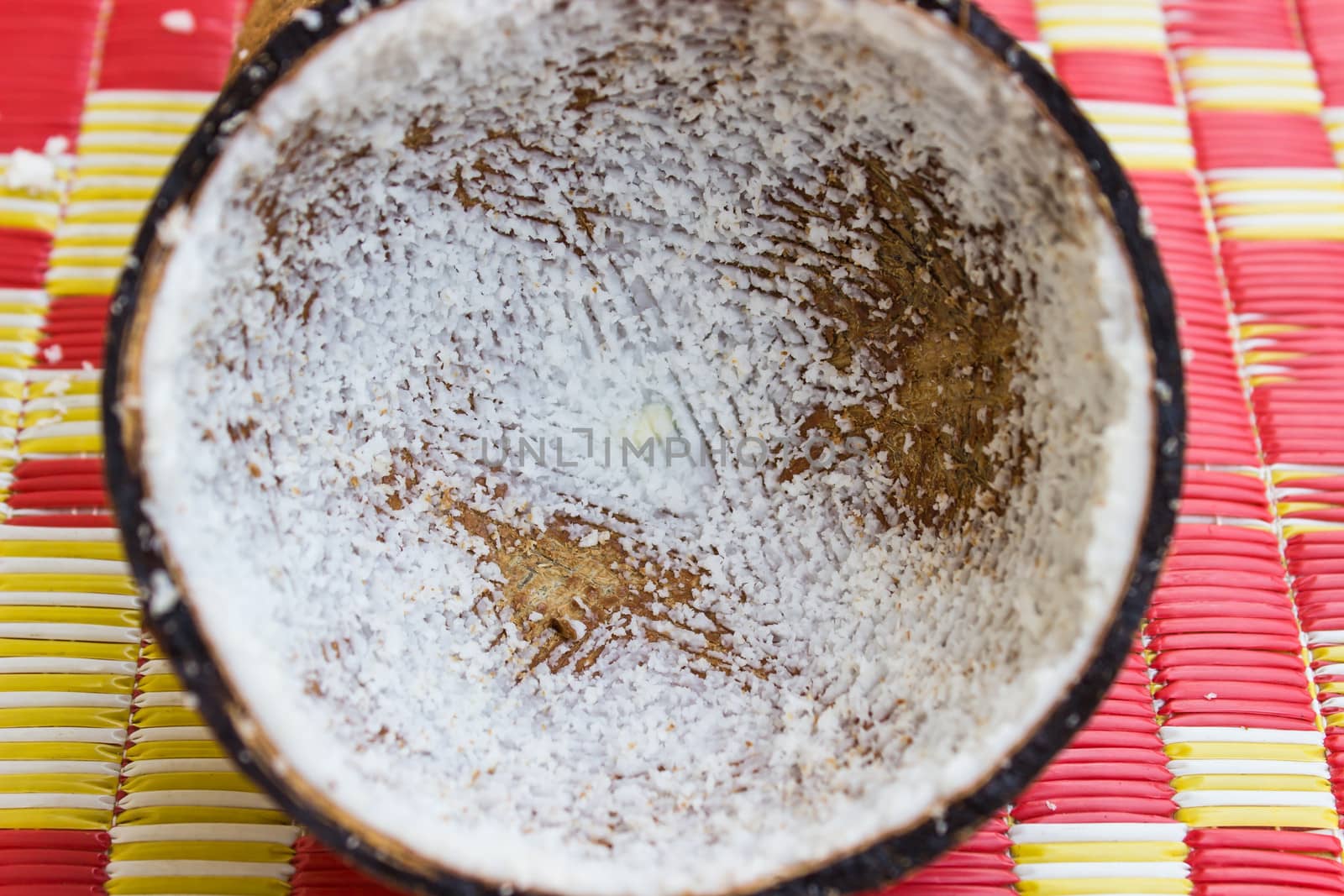 Coconut shell on a mat