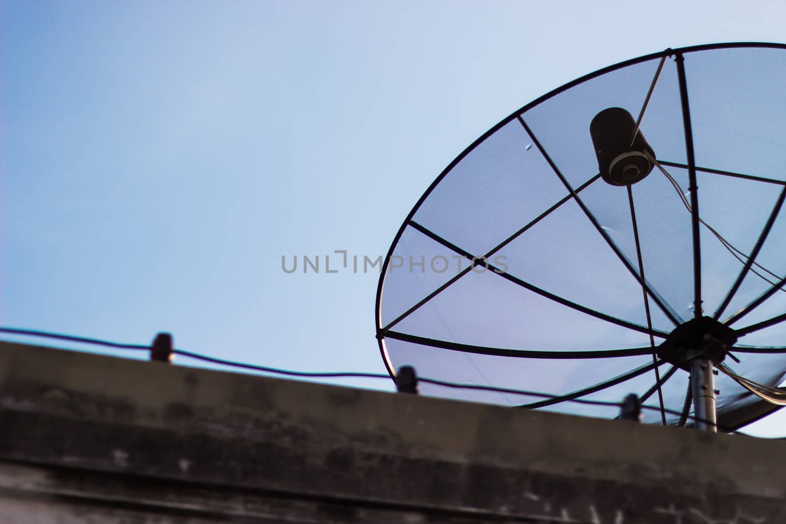 Satellite dish on a terraced house by photo2life