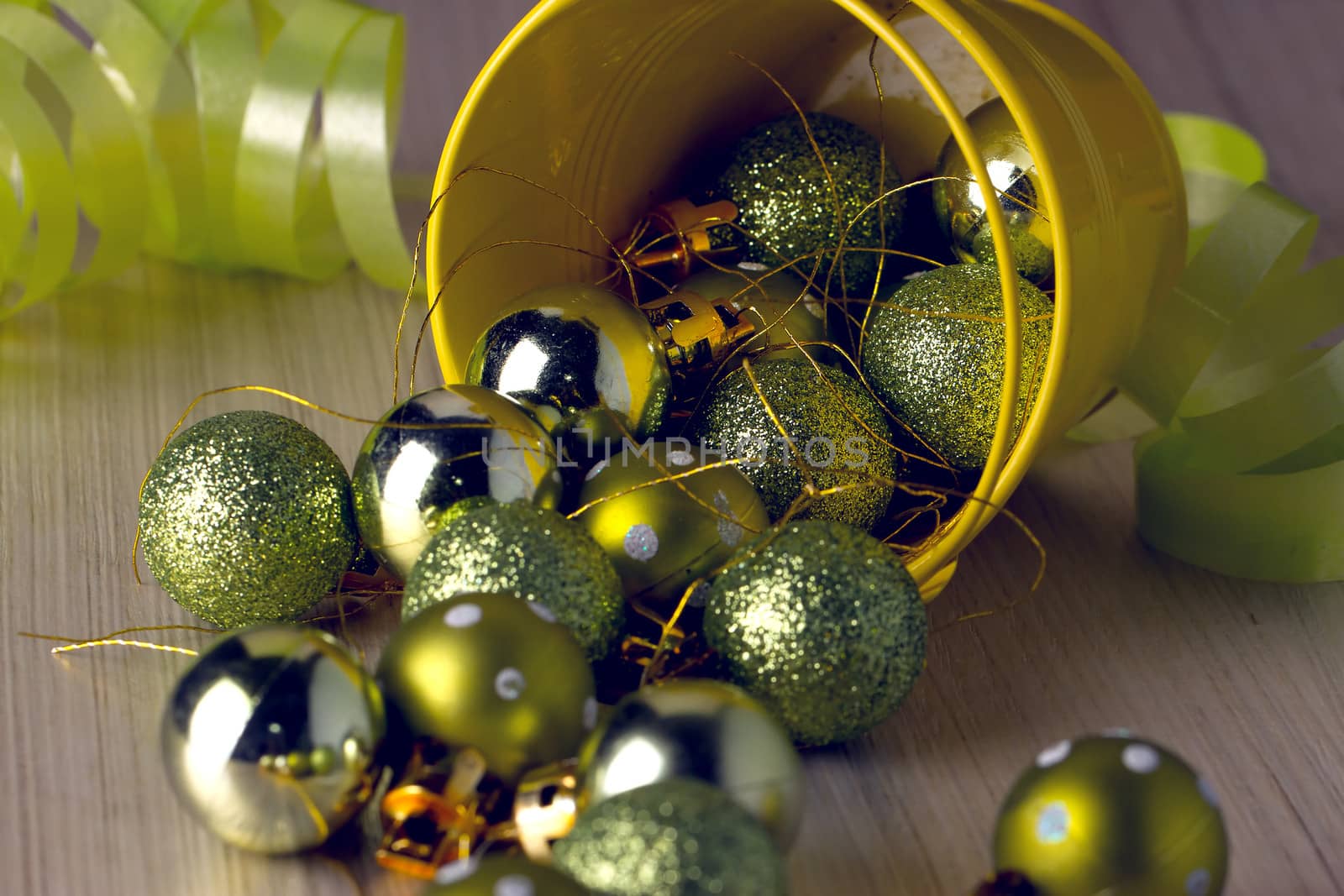 Christmas ornaments in a decorative bucket