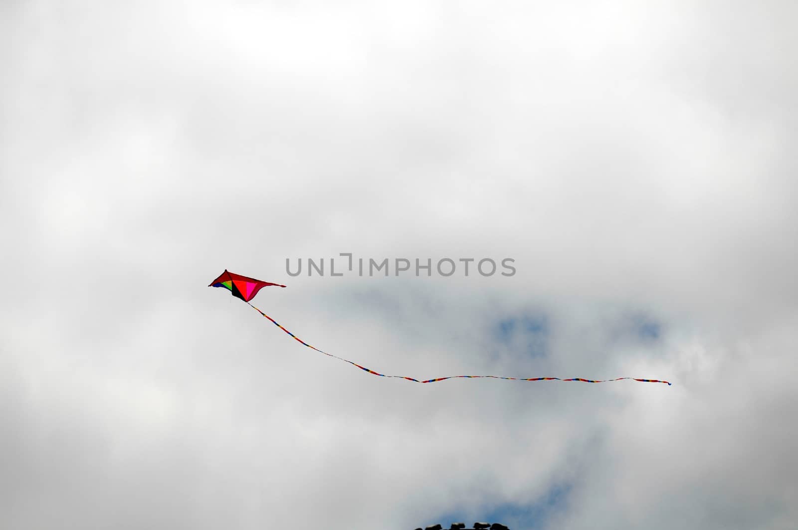 One Kite Flying over a Cloudy Sky, in Canary Islands, Spain