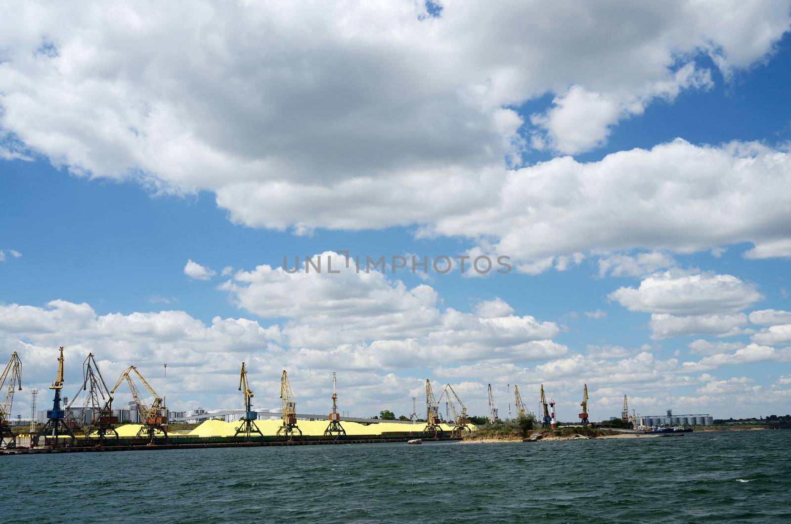 Cargo port with cranes and sulphur firestone near Odessa,Black sea coast,Ukraine 