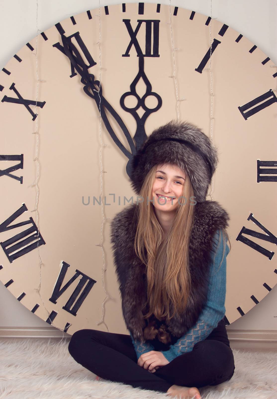 beautiful girl on clocks background lunch time