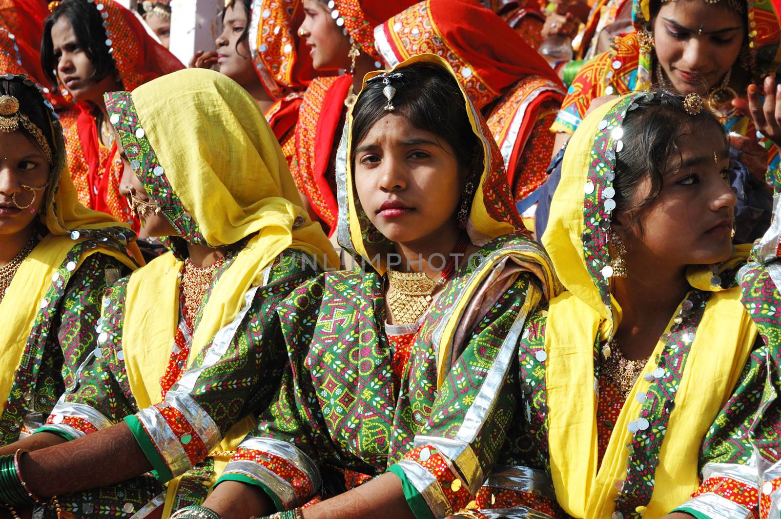 PUSHKAR, INDIA - NOVEMBER 21: Beautiful young indian women are preparing to perfomance at annual camel fair holiday in Pushkar on November 21,2012 in Pushkar, Rajasthan, India