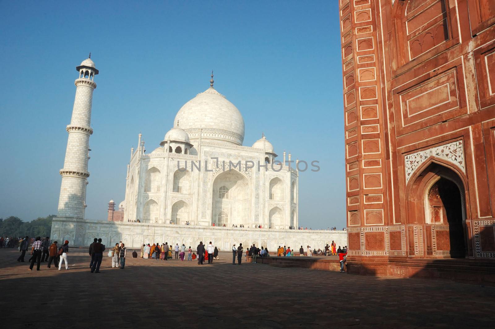 AGRA, UTTAR PRADESH, INDIA - NOVEMBER 18: tourists visiting famous landmark of India - Taj Mahal monument listed as UNESCO World Heritage Site on November 18,2012 in Agra,Uttar Pradesh, India