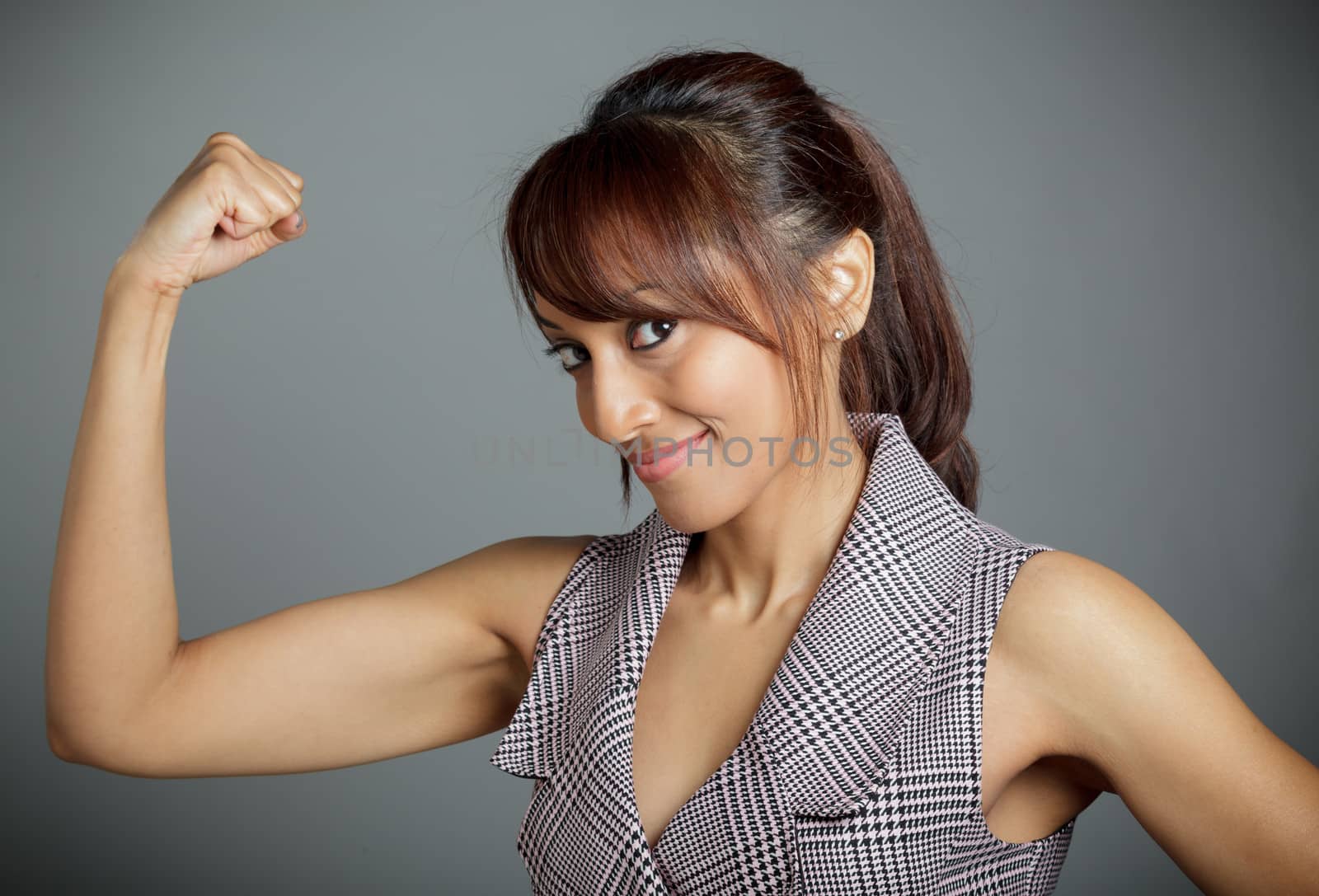 Indian business woman posing in studio isolated on a background