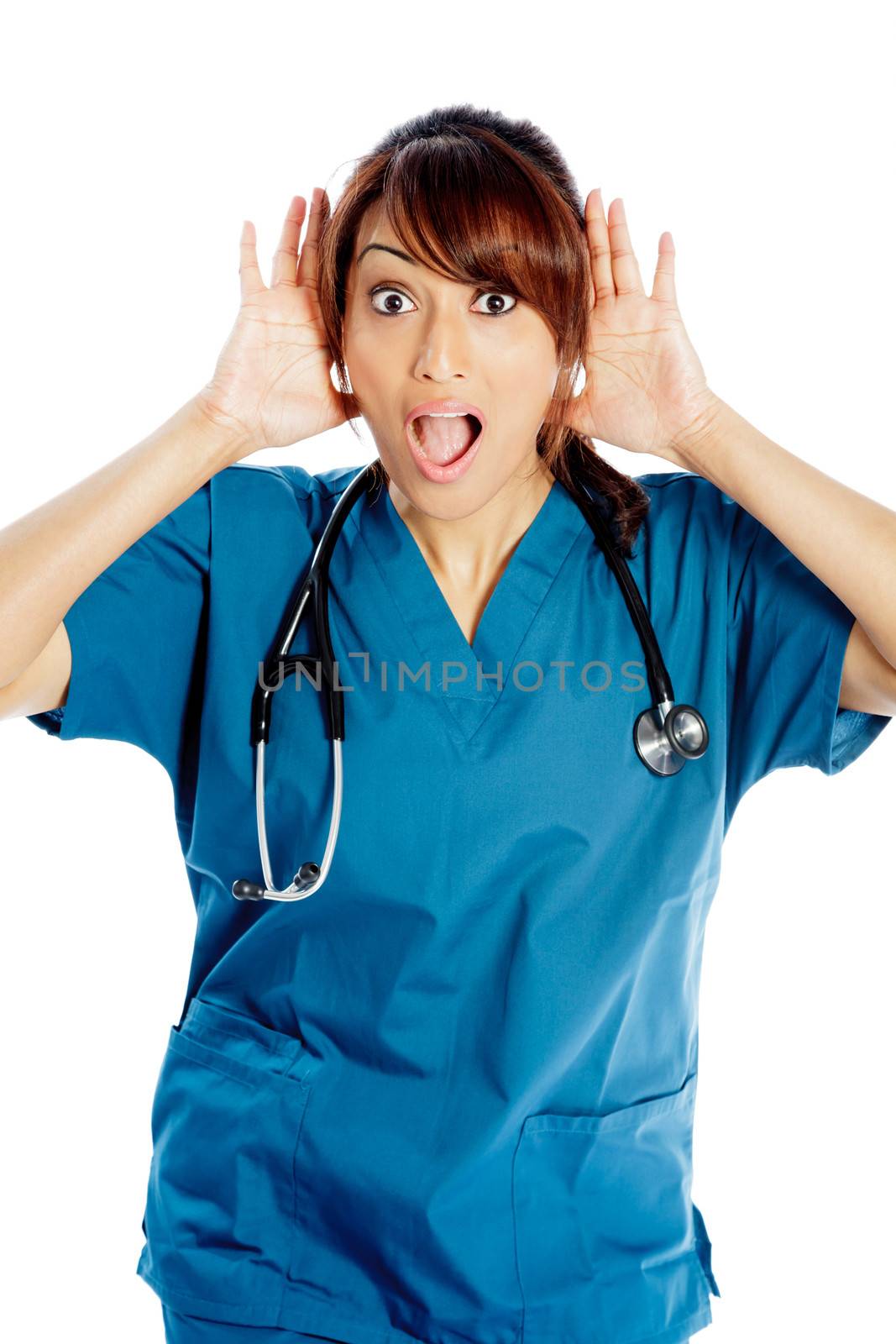 Attractive Indian doctor woman posing in a studio in front of a background