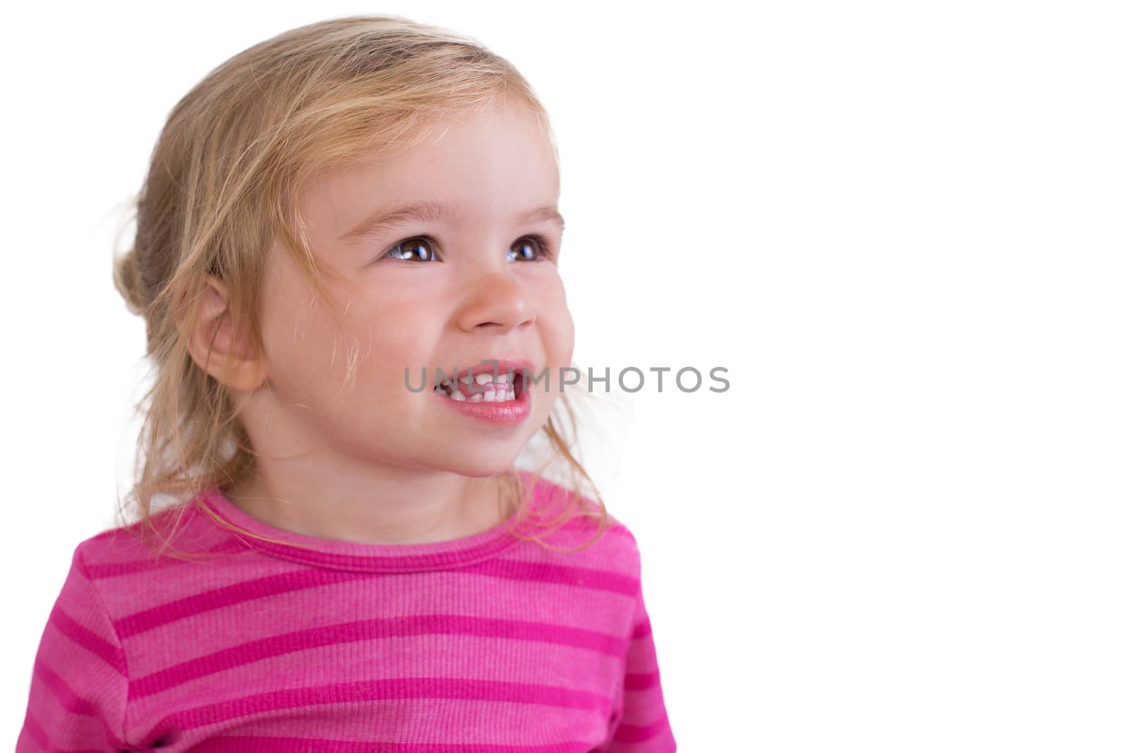 Beautiful toddler giving toothy smile