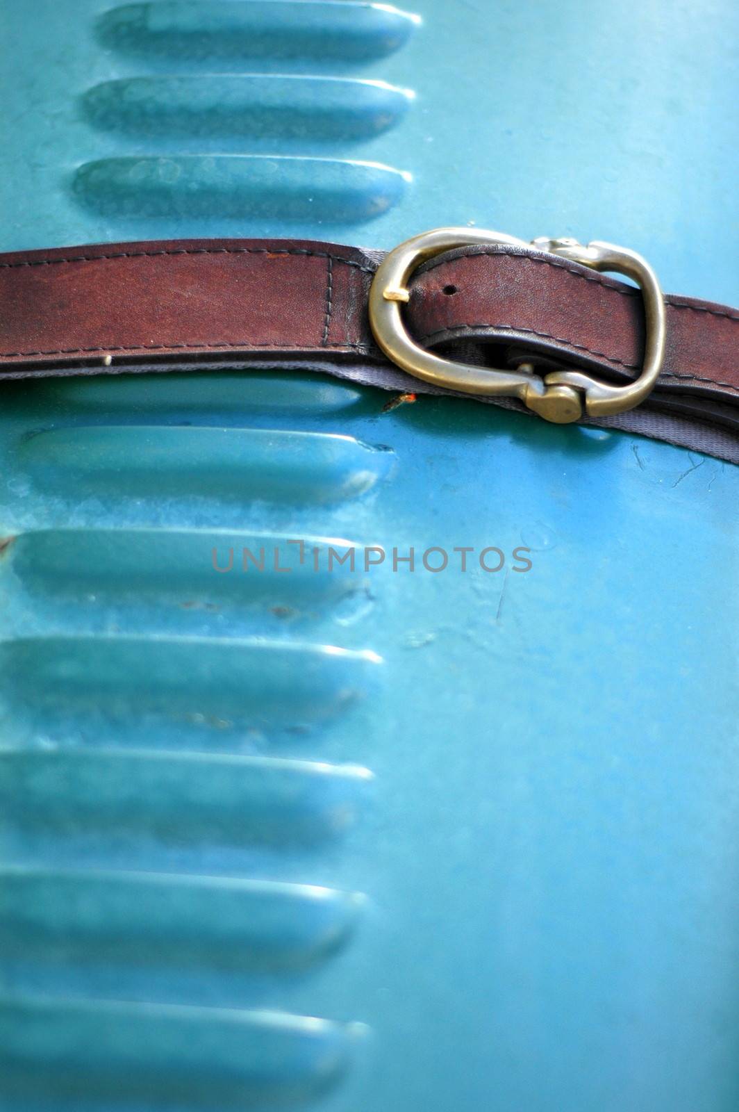 Detail of a Belt on the Hood or Bonnet of a Classic Vintage Car