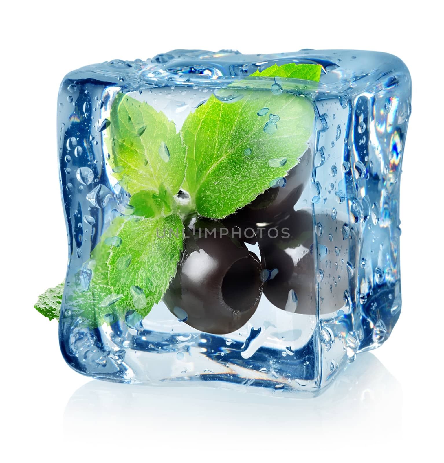 Olives in ice cube isolated on a white background