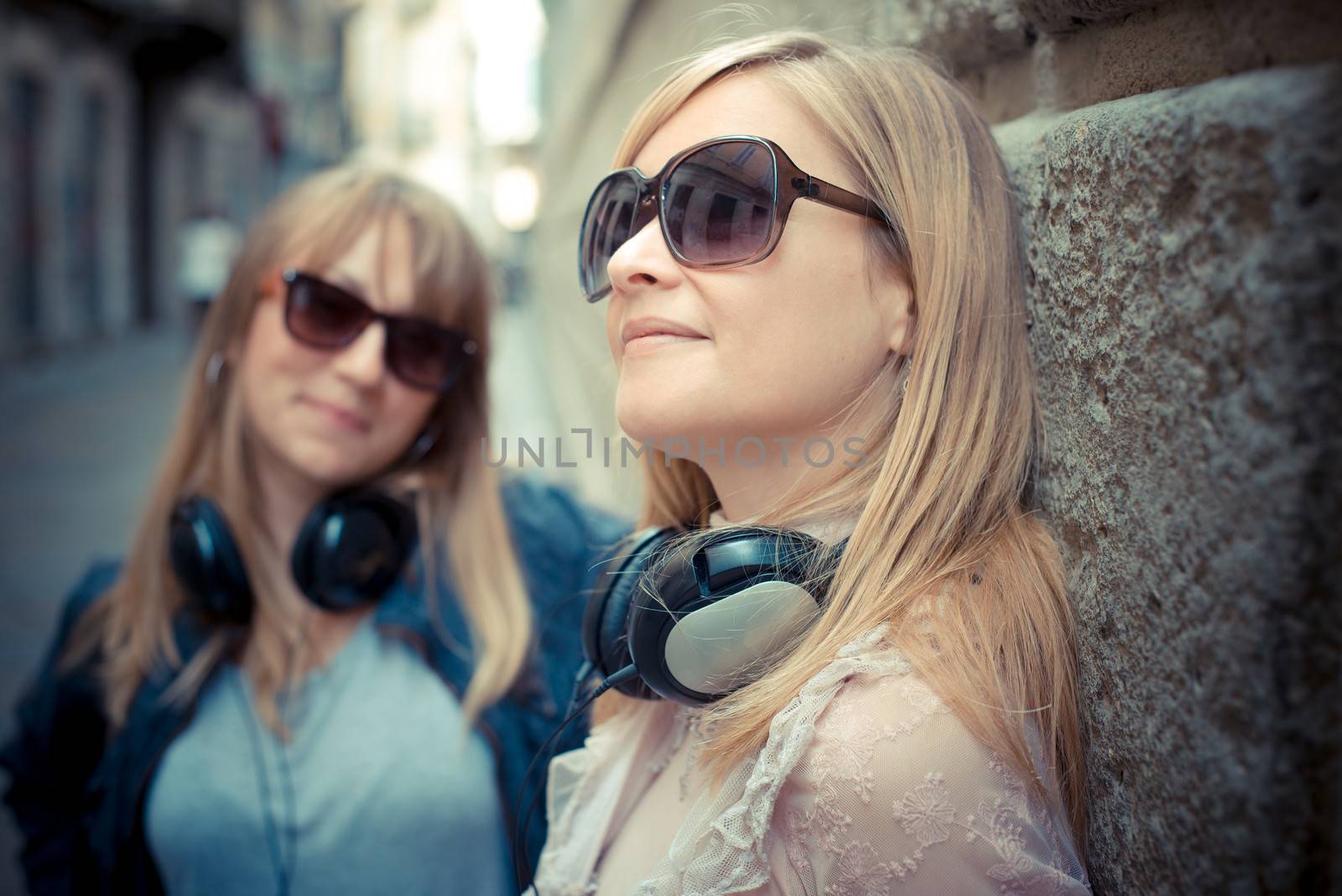 two beautiful blonde women in the city