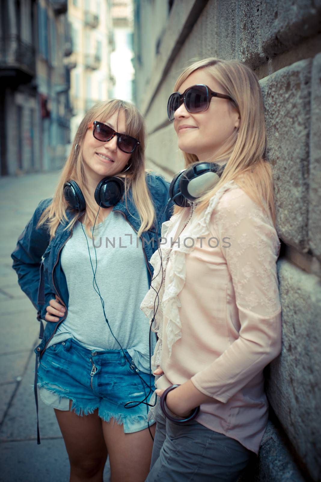 two beautiful blonde women in the city