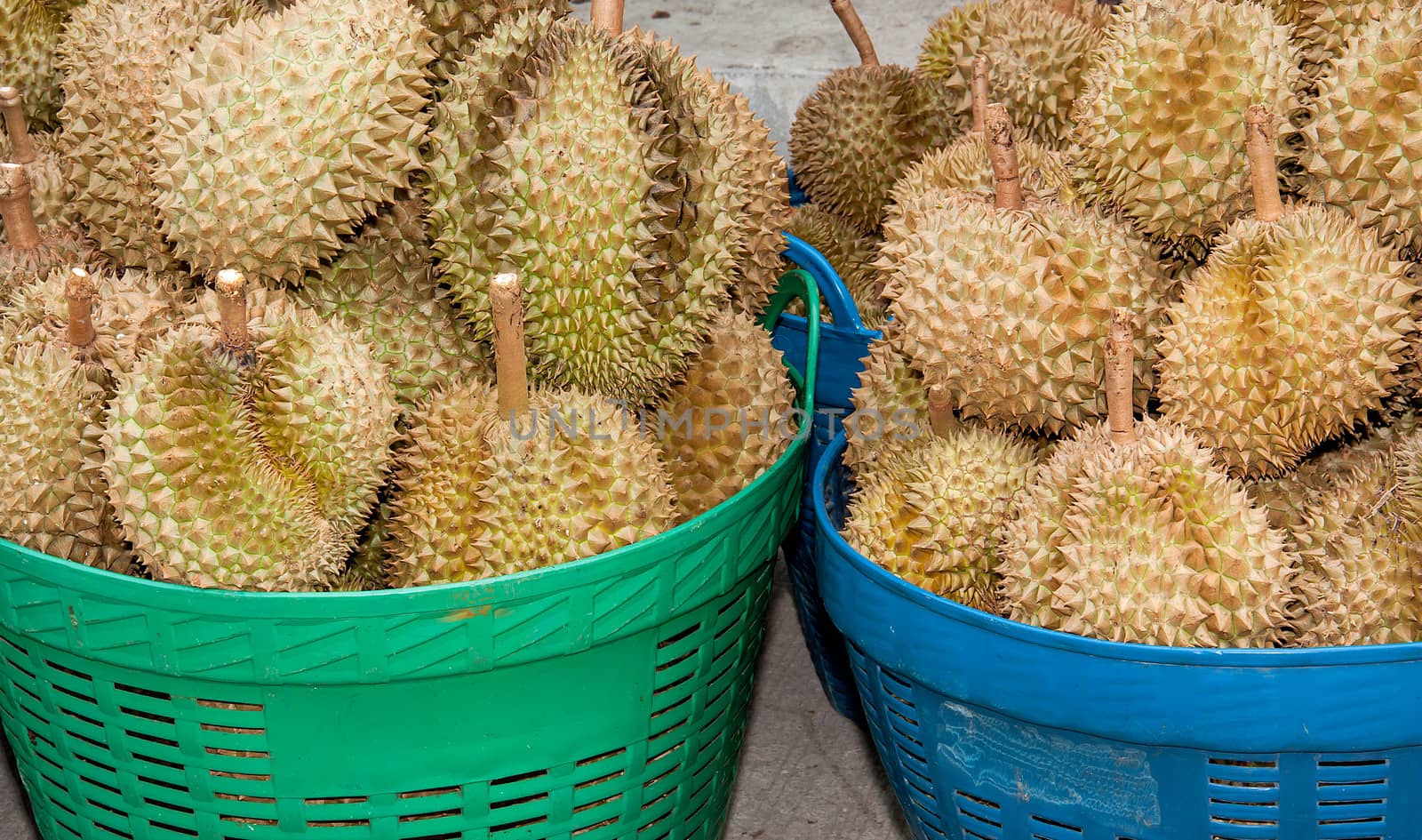 pile of durian In the basket for sale in local market in thailand