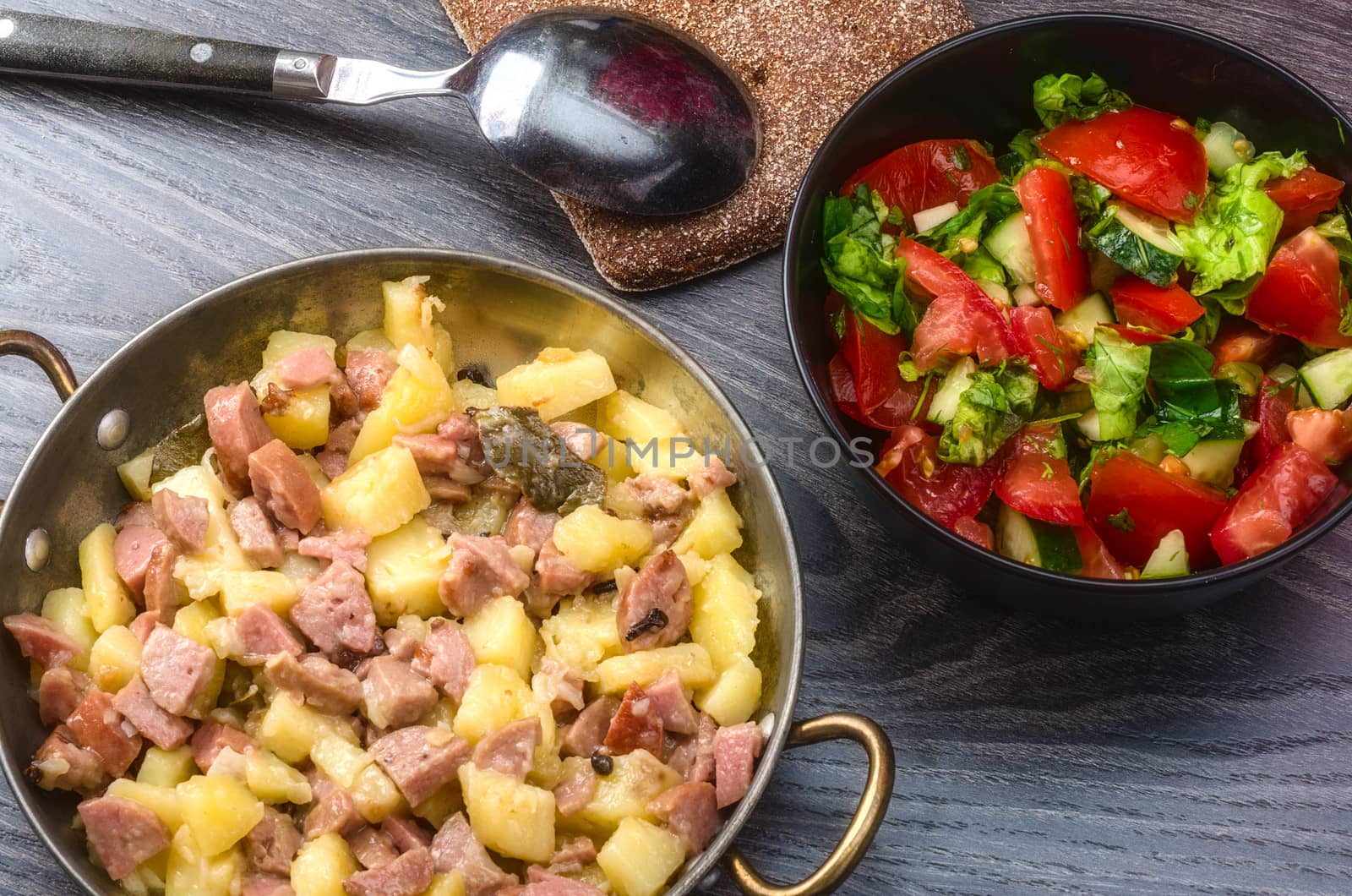 Fried potato with meat and vegetables
