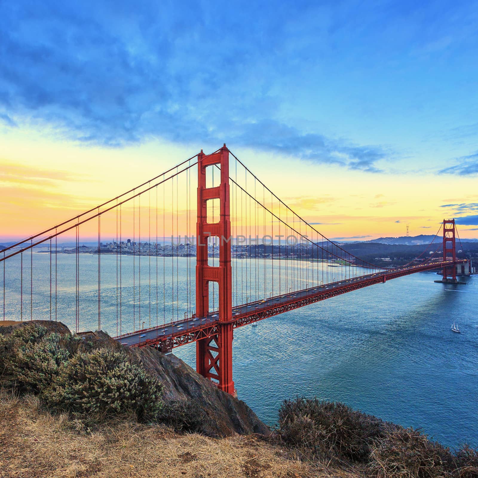 view of famous Golden Gate Bridge at sunset in San Francisco, California, USA 