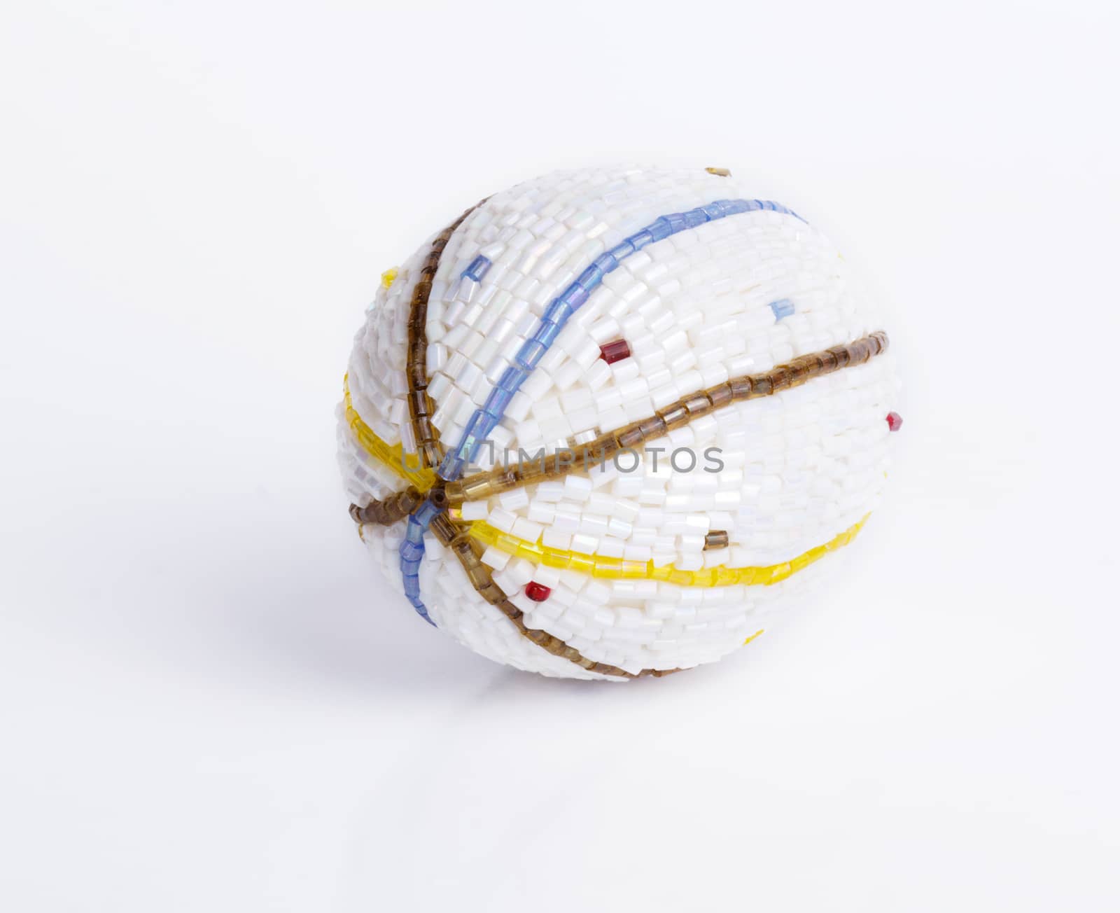 Egg decorated with beads isolated