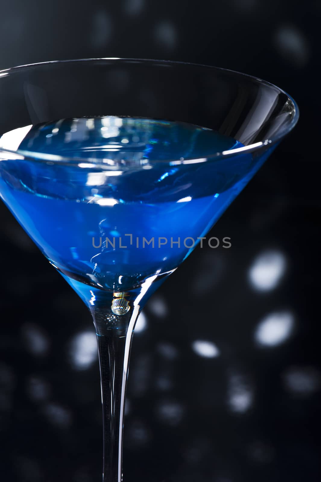 Blue Martini cocktail in an disco setting