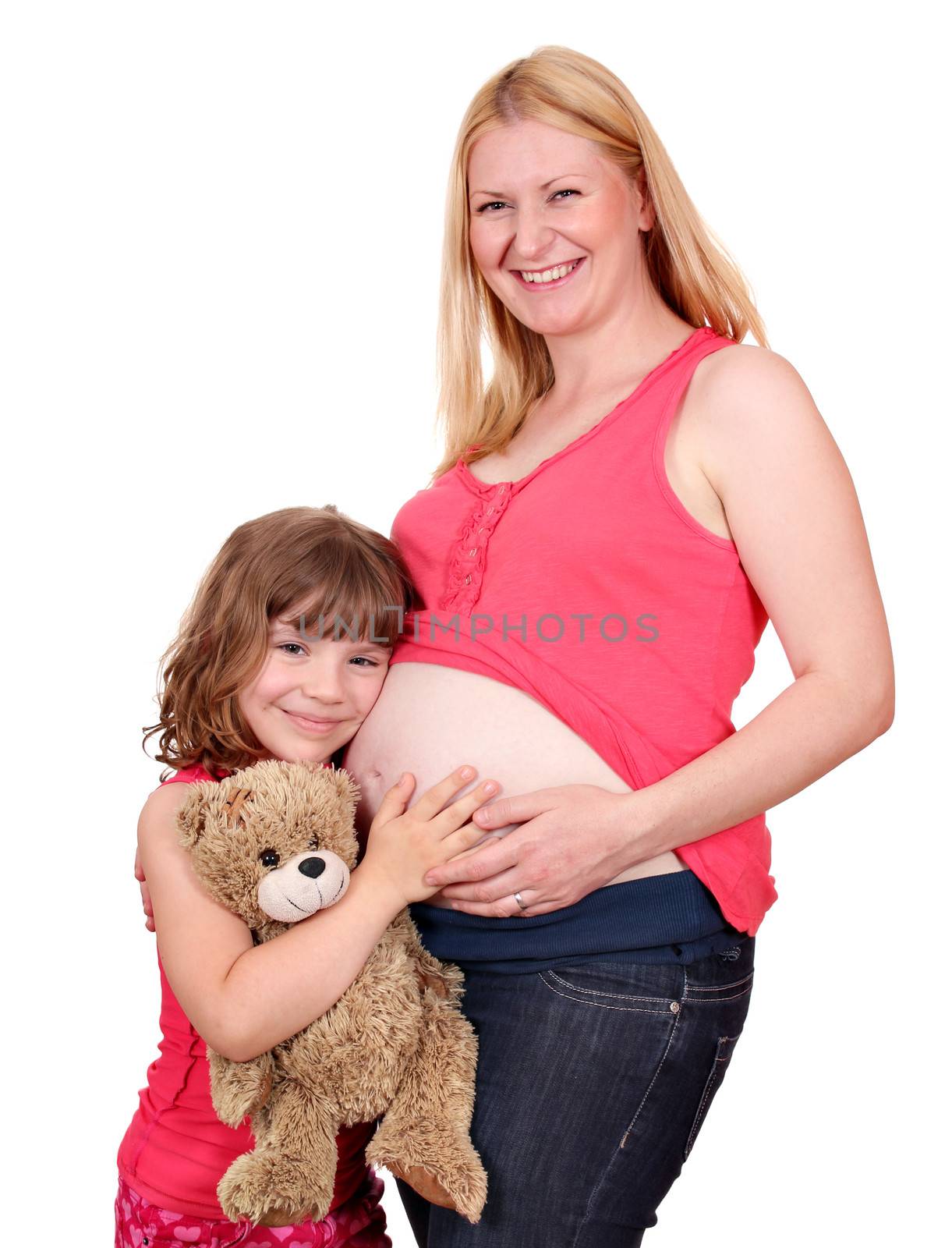 happy pregnant mother and daughter by goce